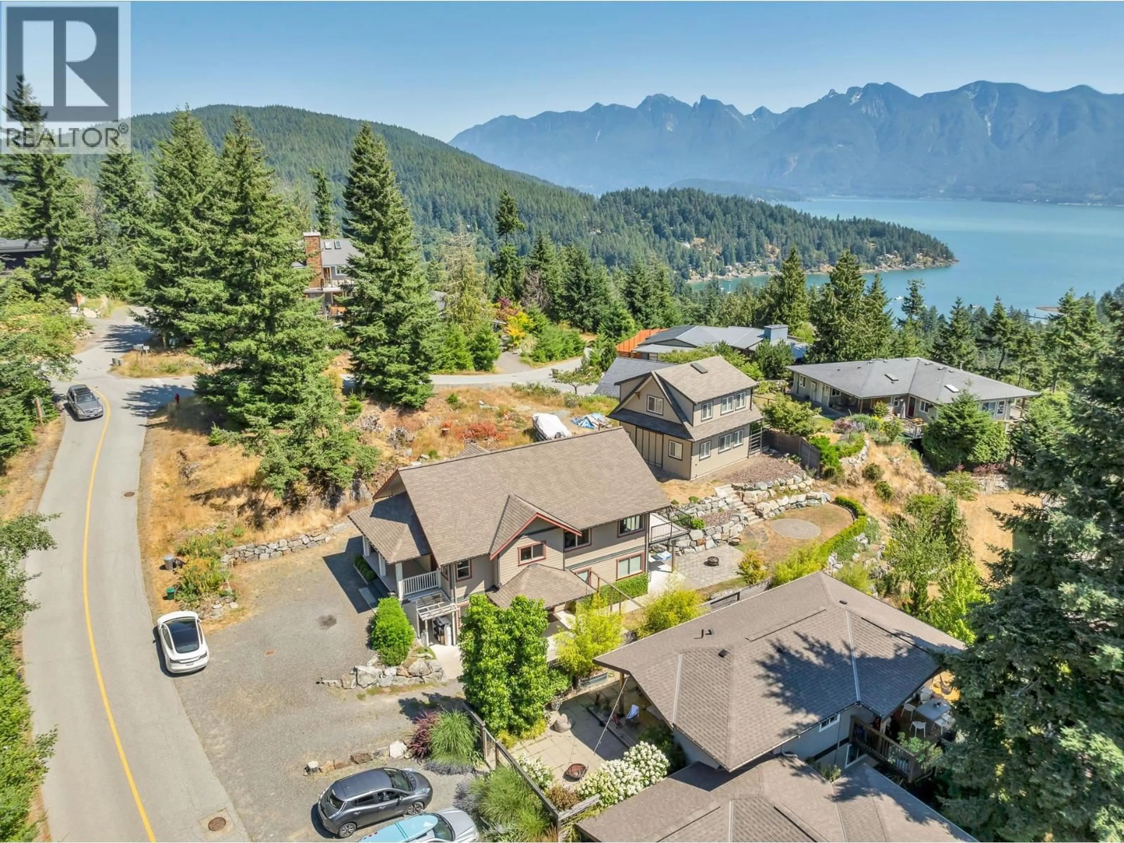 A pic from outside/outdoor area/front of a property/back of a property/a pic from drone, water/lake/river/ocean view for 931 RIVENDELL DRIVE, Bowen Island British Columbia V0N1G1