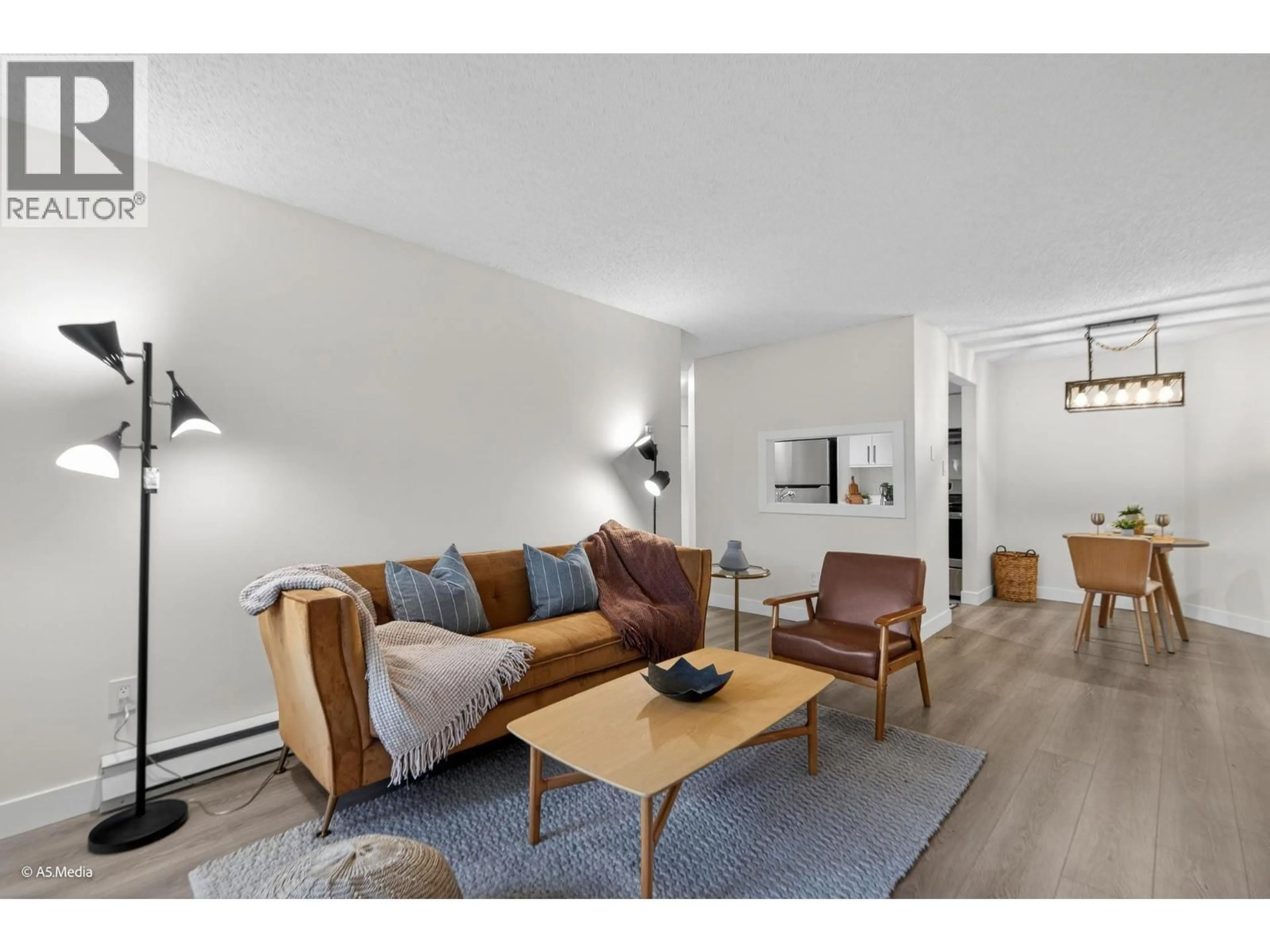 Living room with furniture, wood/laminate floor for 309 - 385 GINGER DRIVE, New Westminster British Columbia V3L5L6