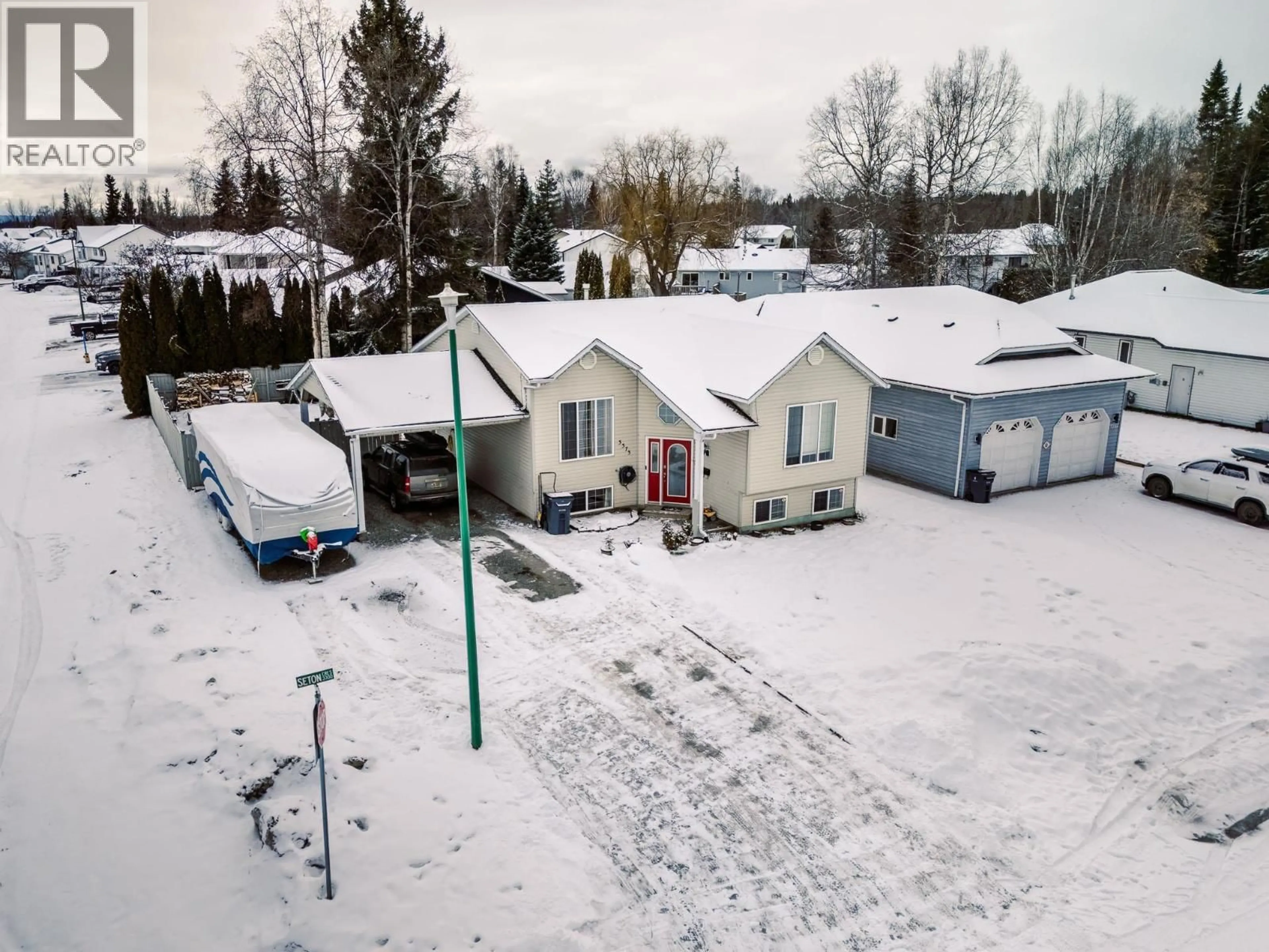 A pic from outside/outdoor area/front of a property/back of a property/a pic from drone, street for 3373 SETON CRESCENT, Prince George British Columbia V2K4X7