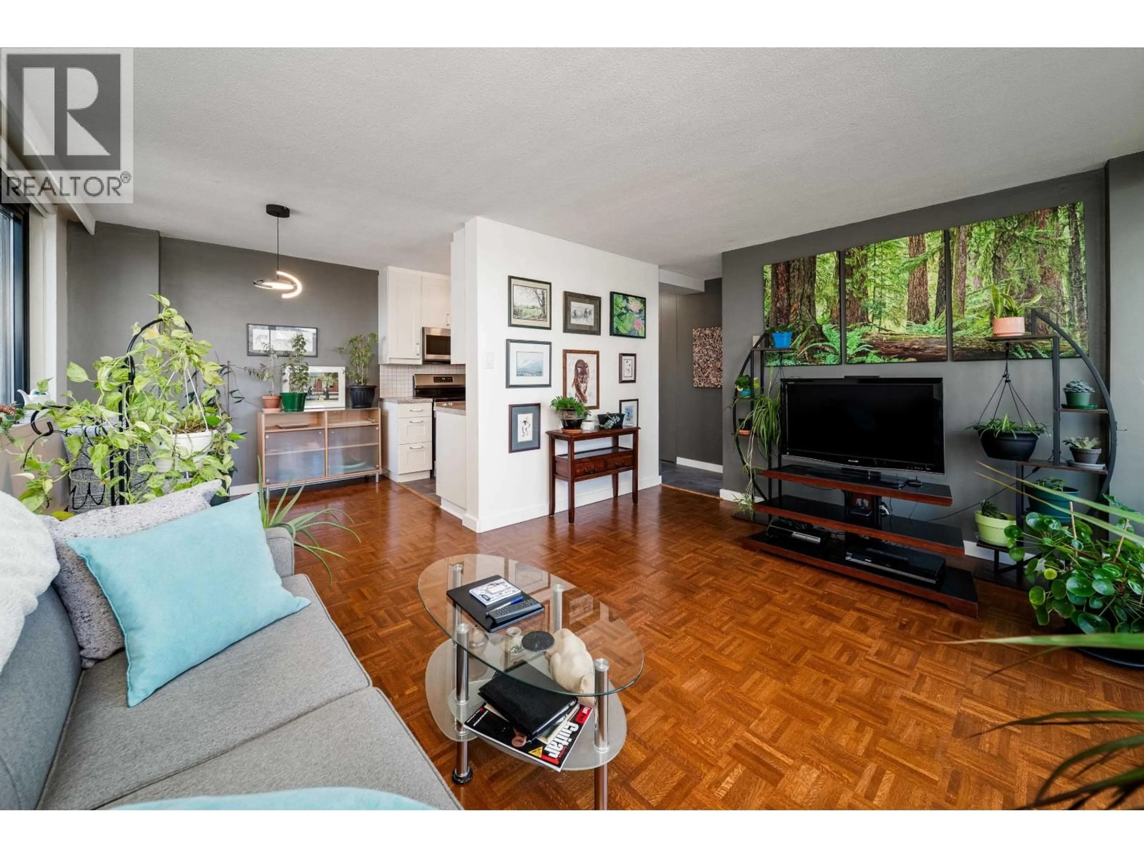 Living room with furniture, wood/laminate floor for 308 - 1330 HARWOOD STREET, Vancouver British Columbia V6E1S8