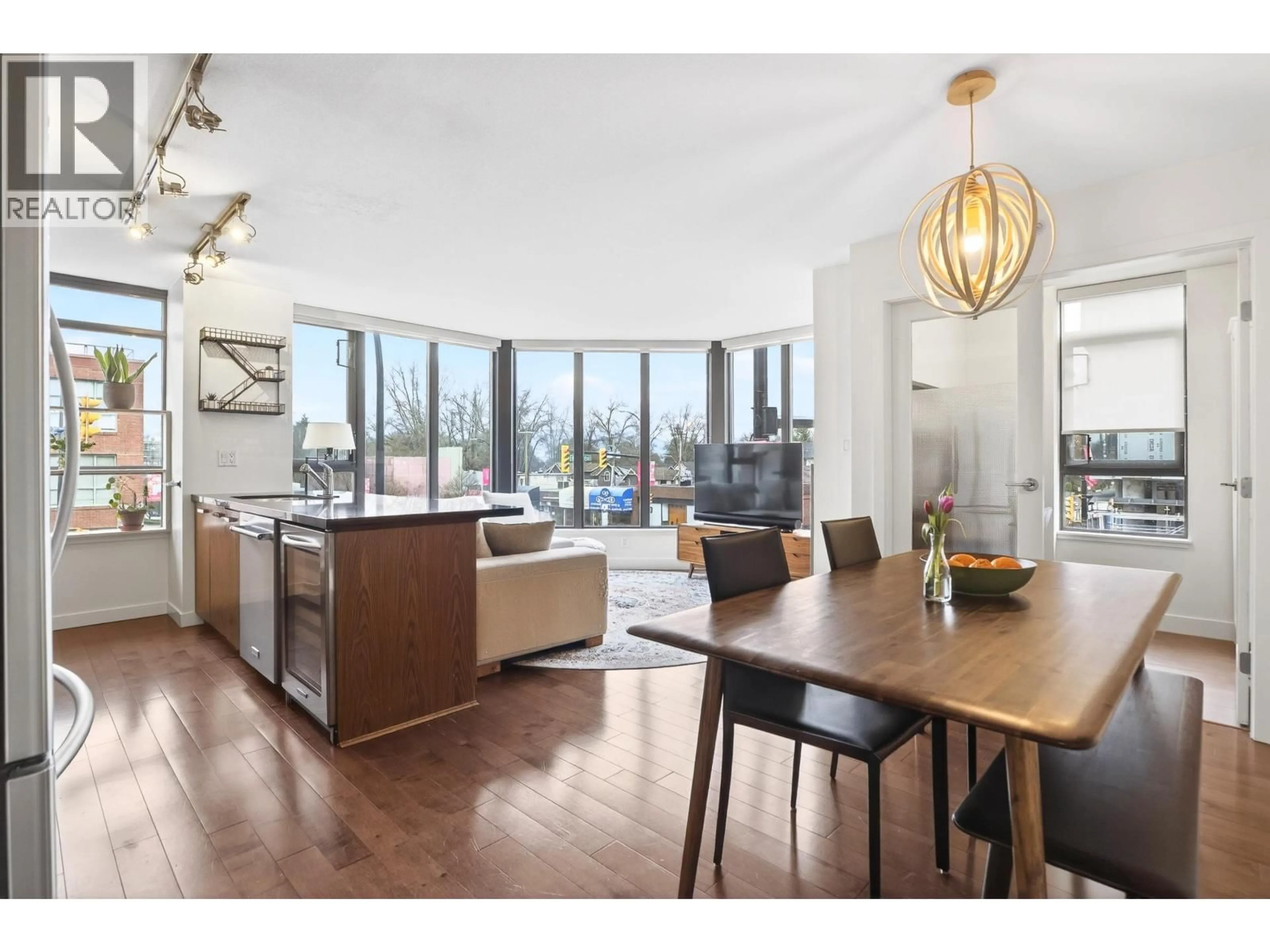 Open concept kitchen, wood/laminate floor for 207 - 3228 TUPPER STREET, Vancouver British Columbia V5Z4S7