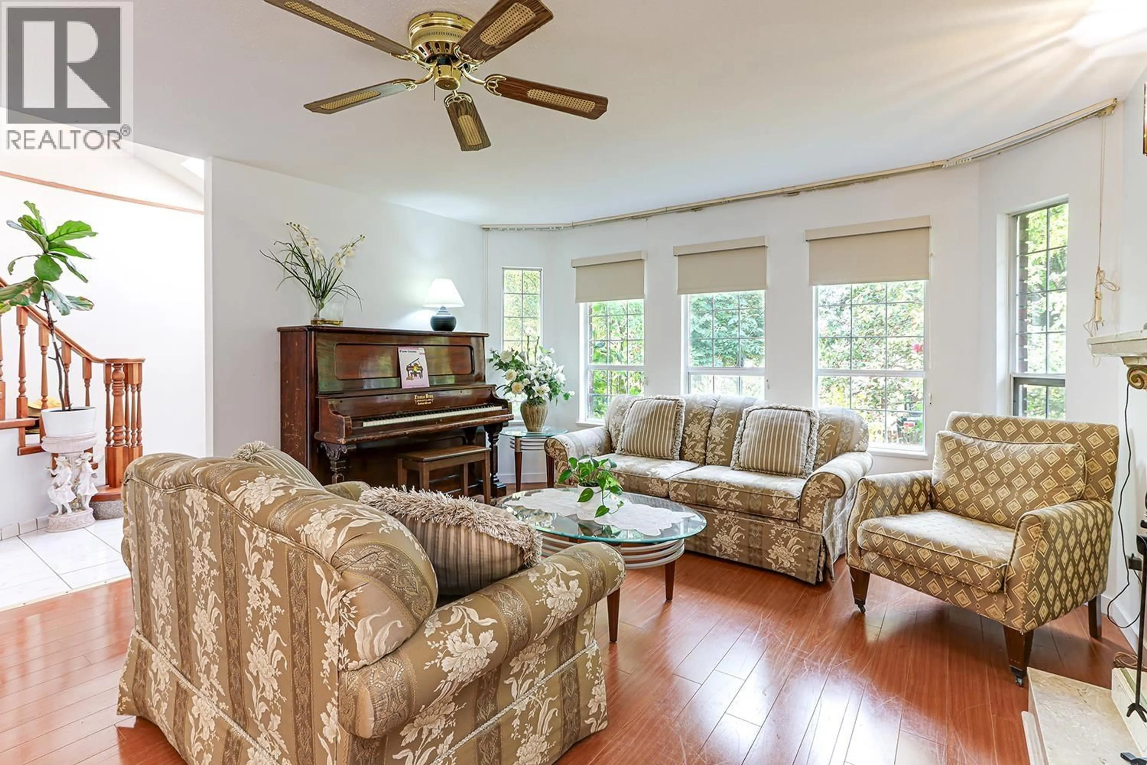 Living room with furniture, wood/laminate floor for 8006 CHESTER STREET, Vancouver British Columbia V5X3Y6
