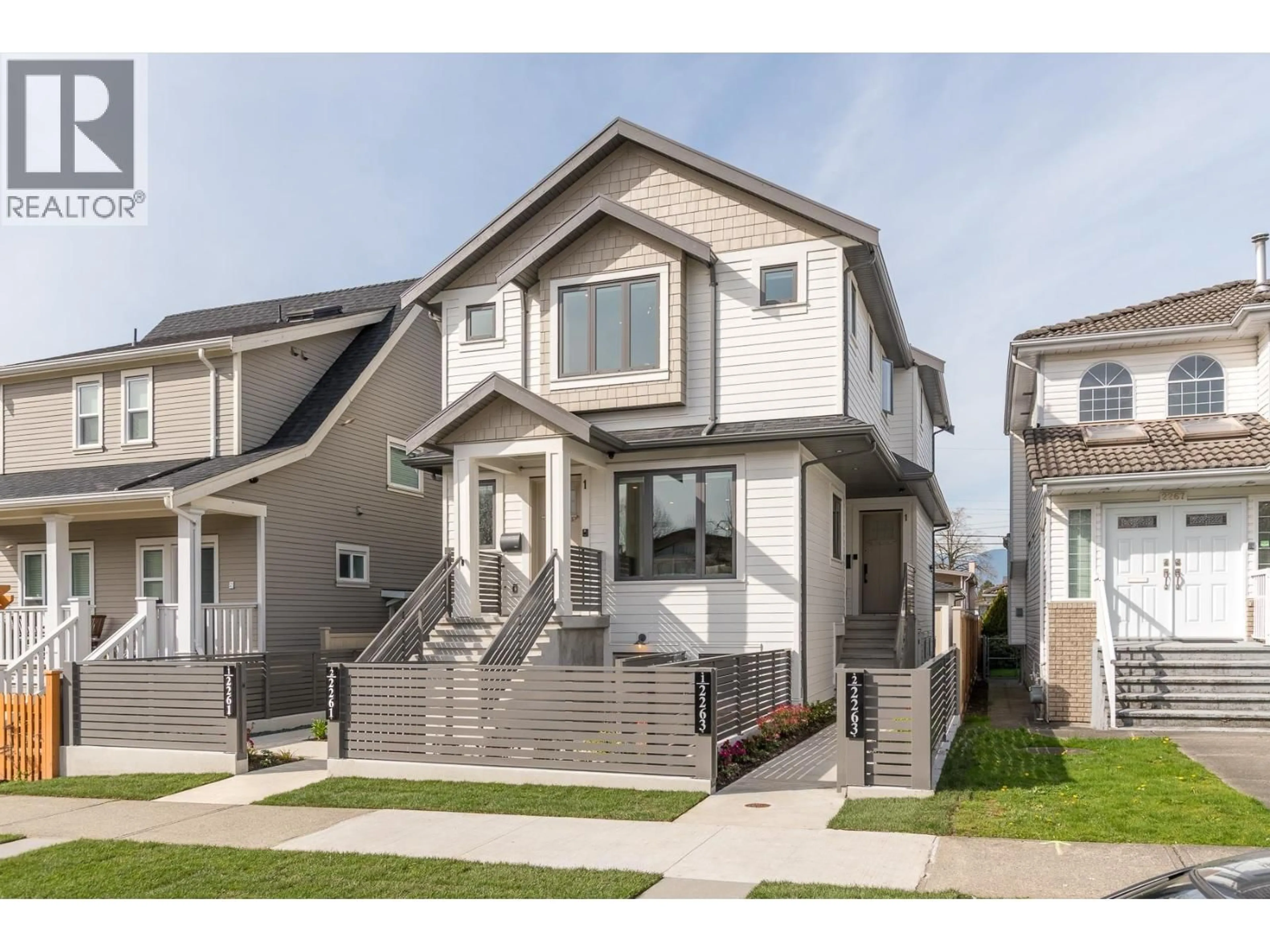 Home with vinyl exterior material, street for 1 - 2263 35TH AVENUE, Vancouver British Columbia V5P1C1