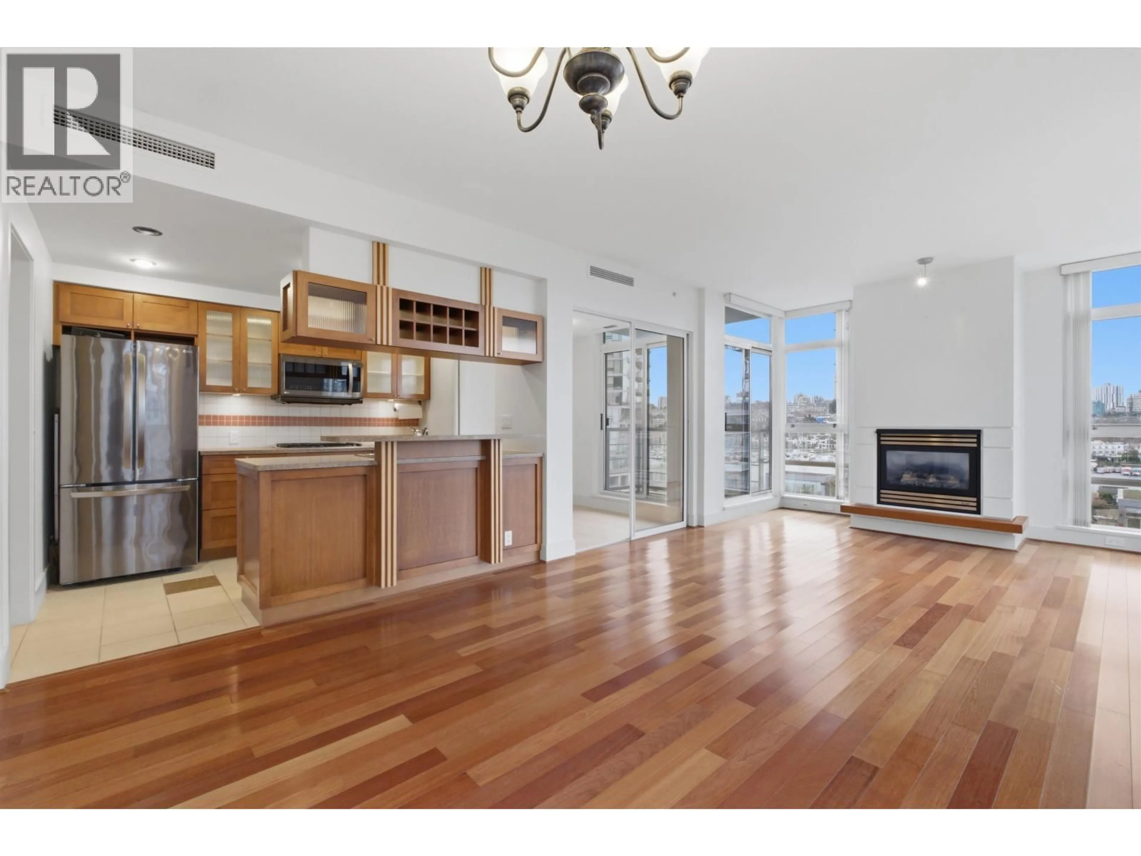 Open concept kitchen, wood/laminate floor for 706 - 1483 HOMER STREET, Vancouver British Columbia V6Z3C7