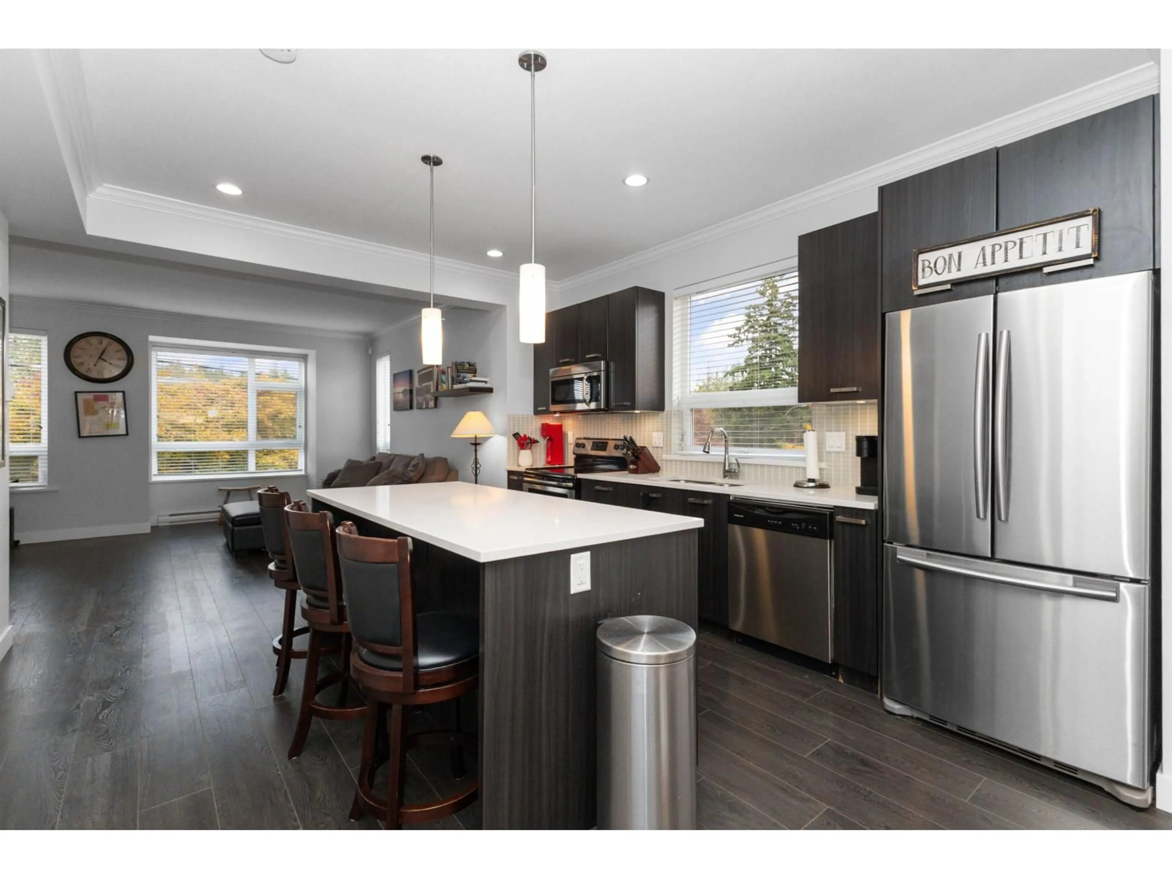 Open concept kitchen, wood/laminate floor for 126 - 5888 144TH STREET, Surrey British Columbia V3X0G8