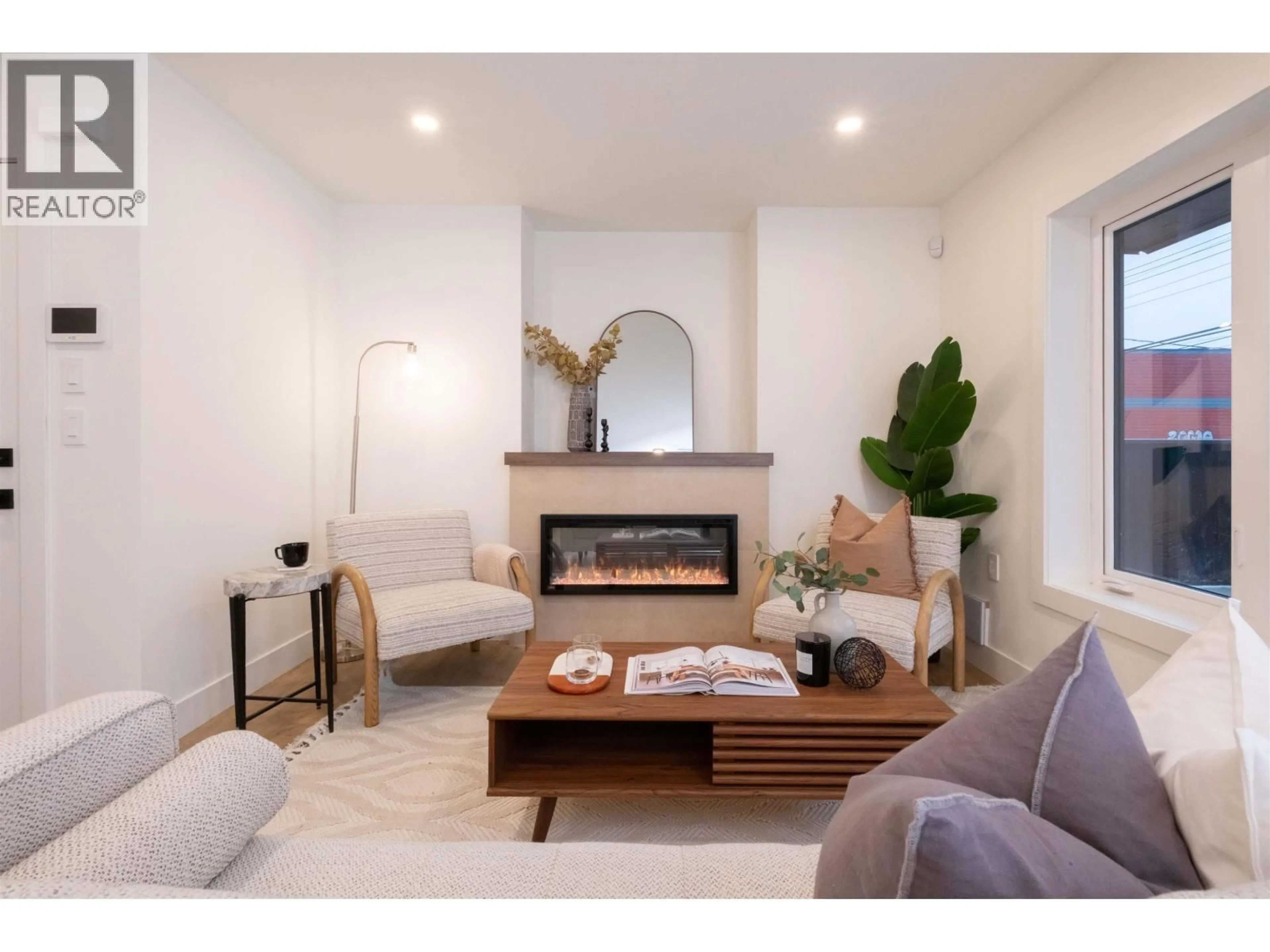 Living room with furniture, unknown for 2665 PENDER STREET, Vancouver British Columbia V5K2B6