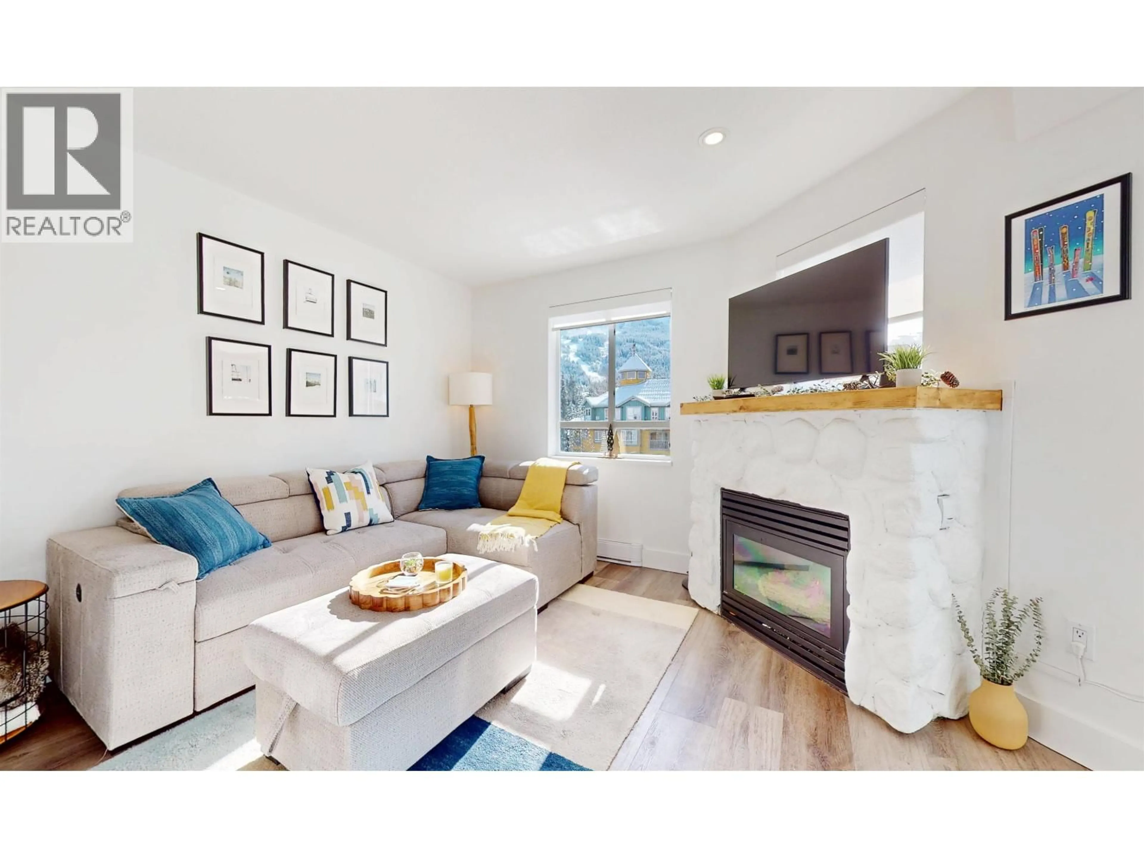 Living room with furniture, wood/laminate floor for 449 - 4314 MAIN STREET, Whistler British Columbia V8E1A8