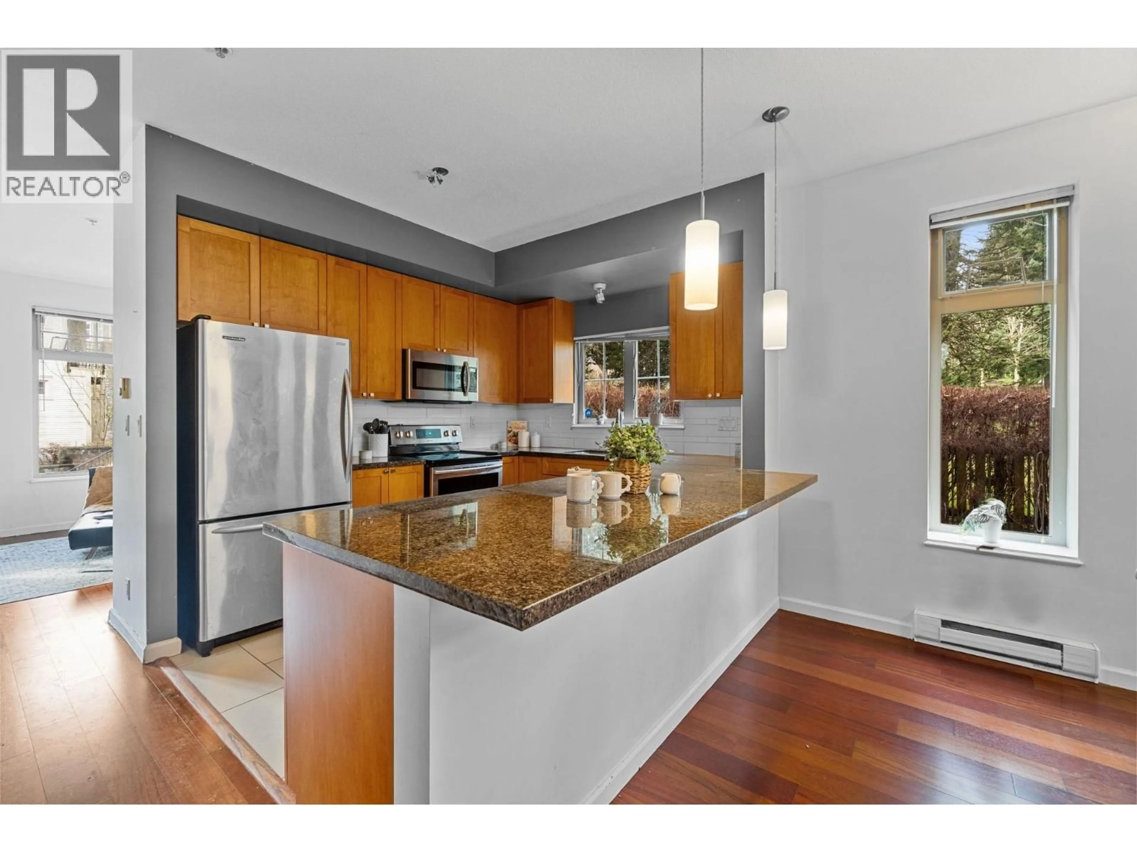 Open concept kitchen, wood/laminate floor for 13 - 245 FRANCIS WAY, New Westminster British Columbia V3L0A7
