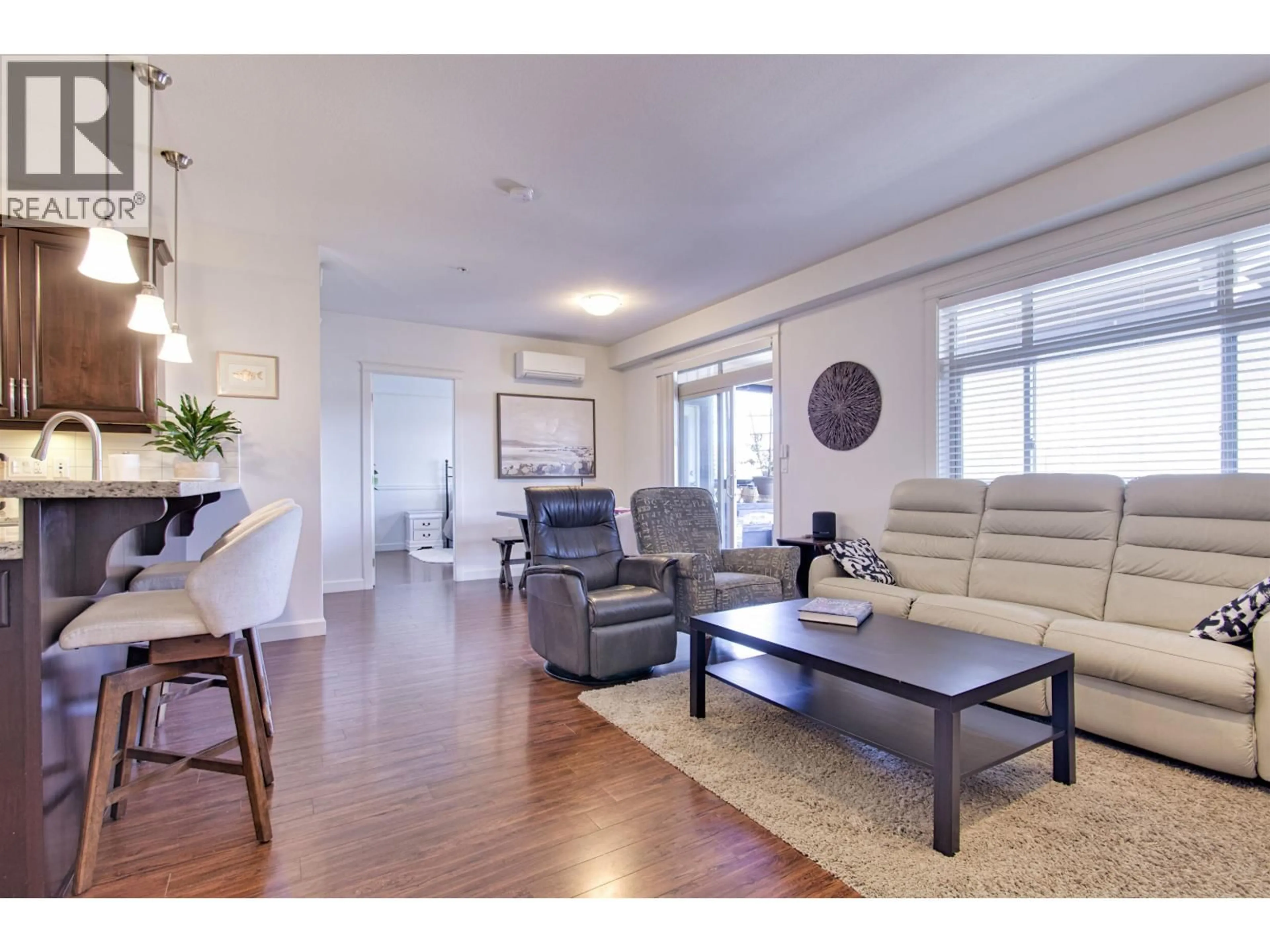 Living room with furniture, wood/laminate floor for 211 - 12655 190A STREET, Pitt Meadows British Columbia V3Y0E9