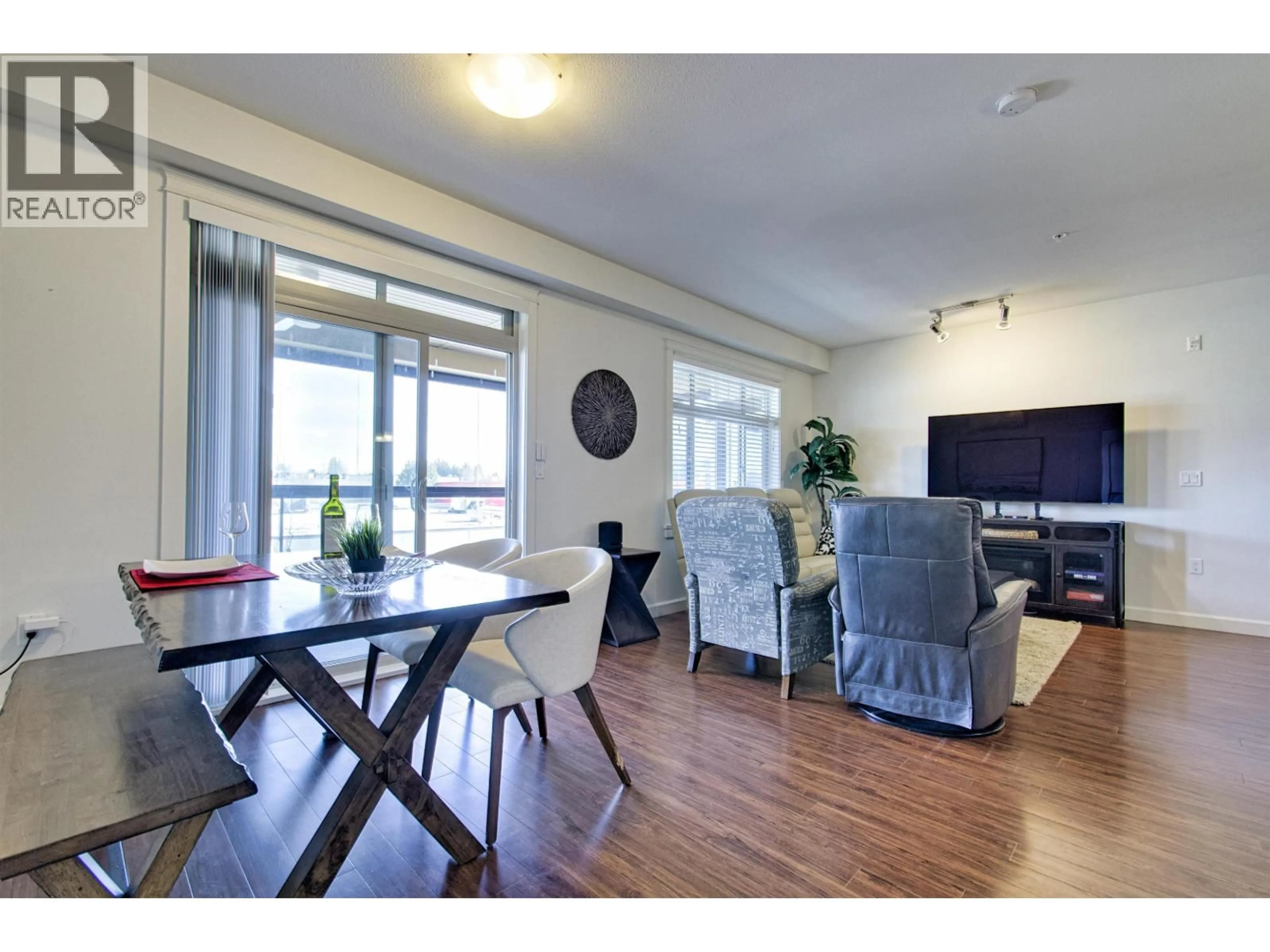 Living room with furniture, wood/laminate floor for 211 - 12655 190A STREET, Pitt Meadows British Columbia V3Y0E9