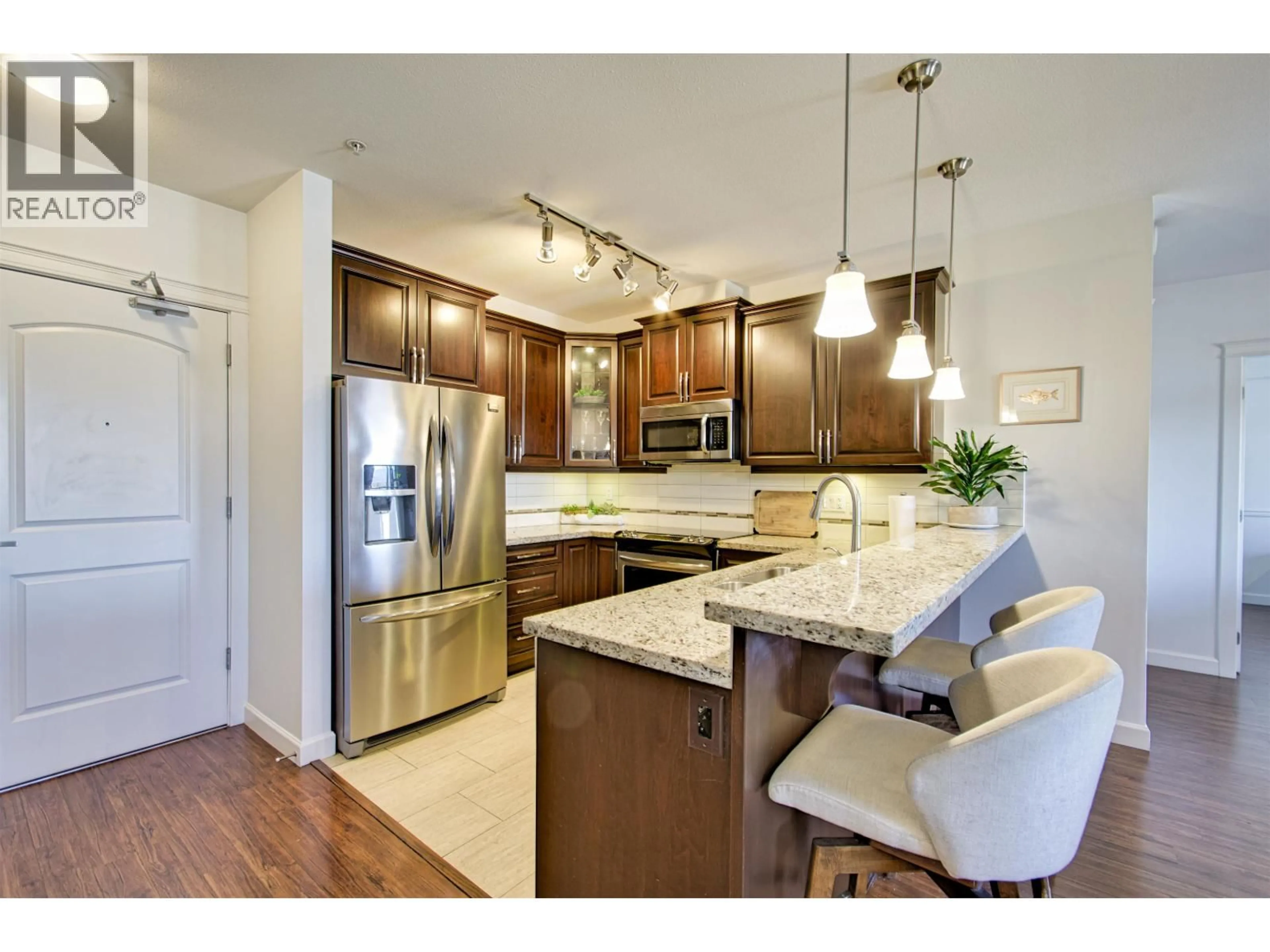 Open concept kitchen, unknown for 211 - 12655 190A STREET, Pitt Meadows British Columbia V3Y0E9