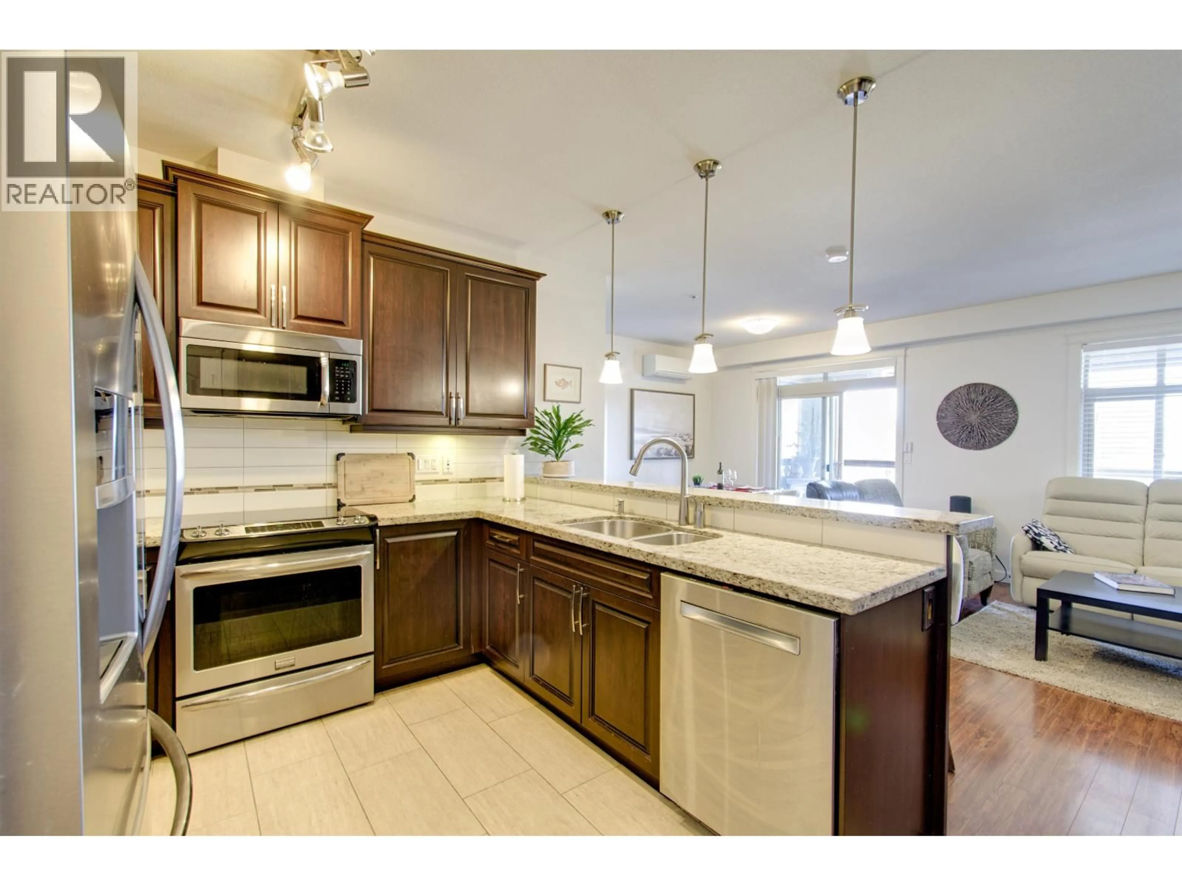 Open concept kitchen, ceramic/tile floor for 211 - 12655 190A STREET, Pitt Meadows British Columbia V3Y0E9