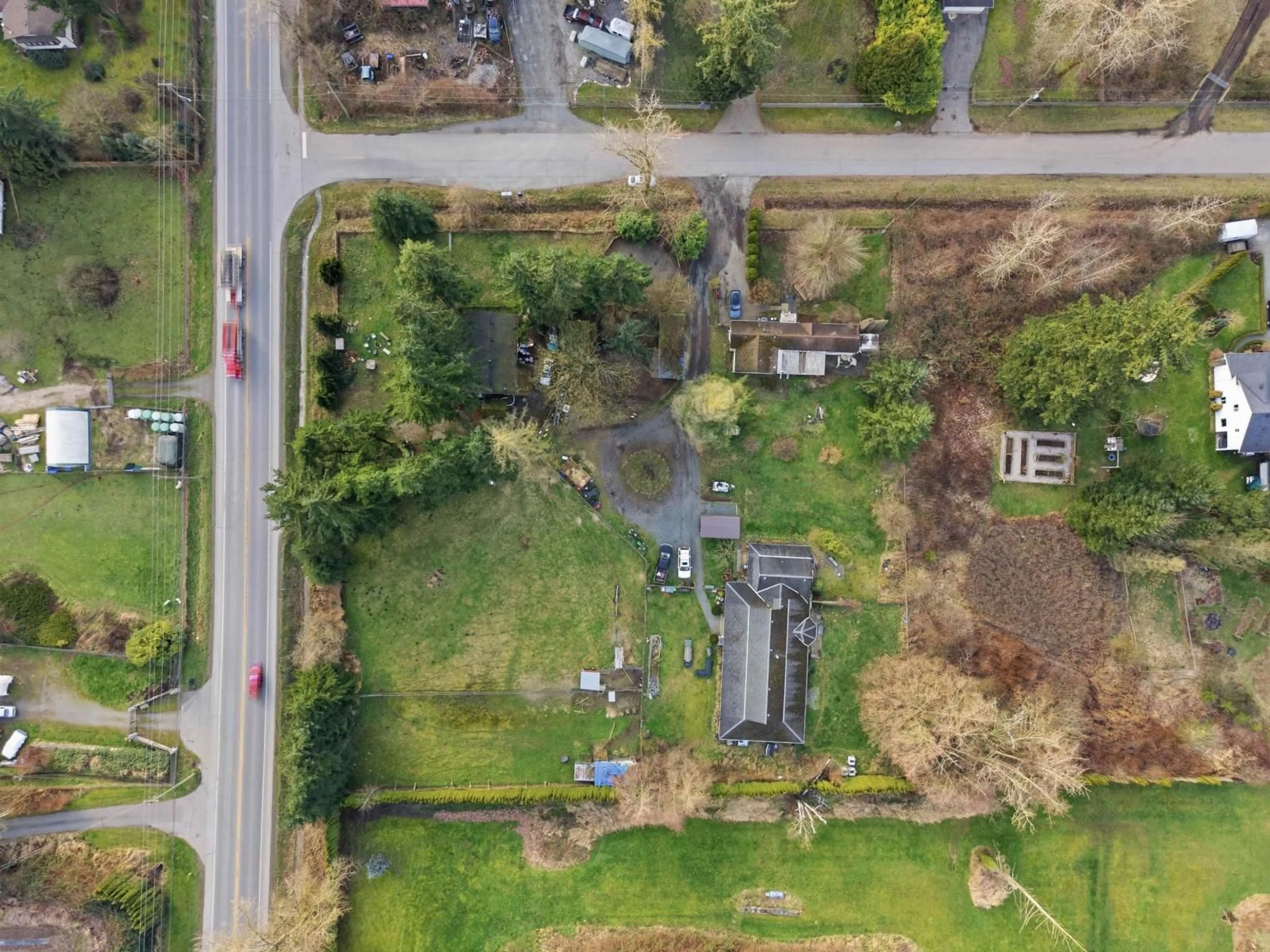 A pic from outside/outdoor area/front of a property/back of a property/a pic from drone, street for 19751 16 AVENUE, Langley British Columbia V2Z1K2