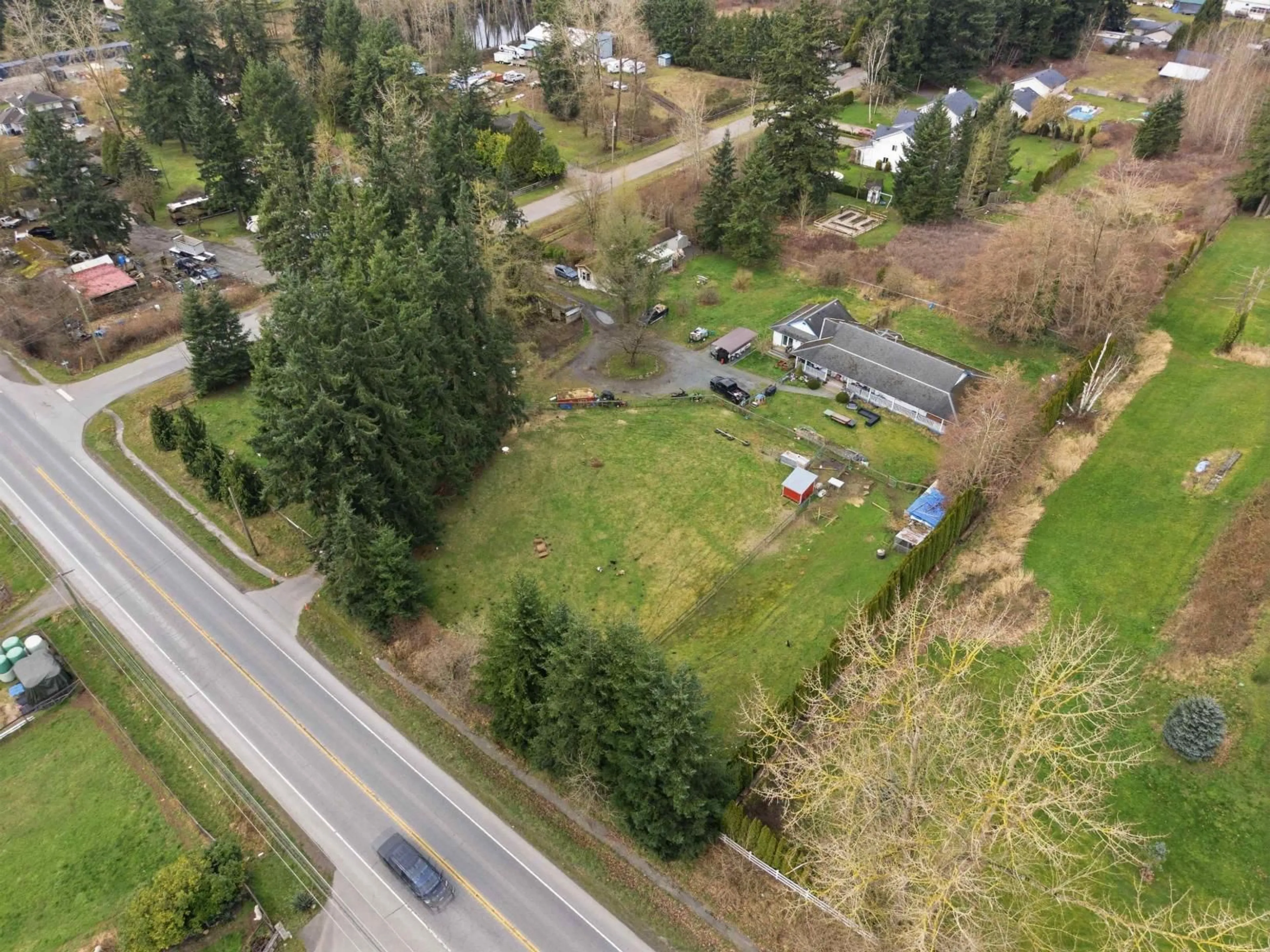 A pic from outside/outdoor area/front of a property/back of a property/a pic from drone, street for 19751 16 AVENUE, Langley British Columbia V2Z1K2