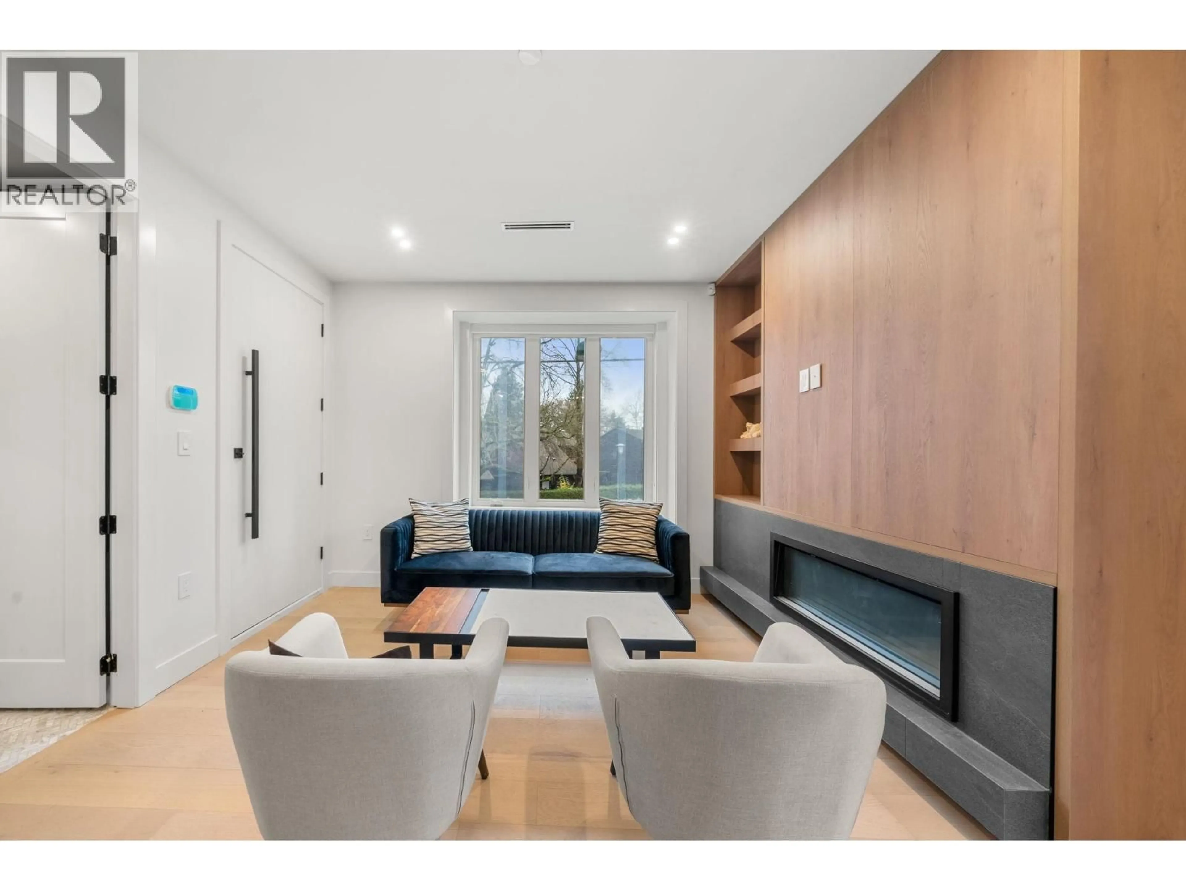 Living room with furniture, wood/laminate floor for 3483 ADANAC STREET, Vancouver British Columbia V5K4P4