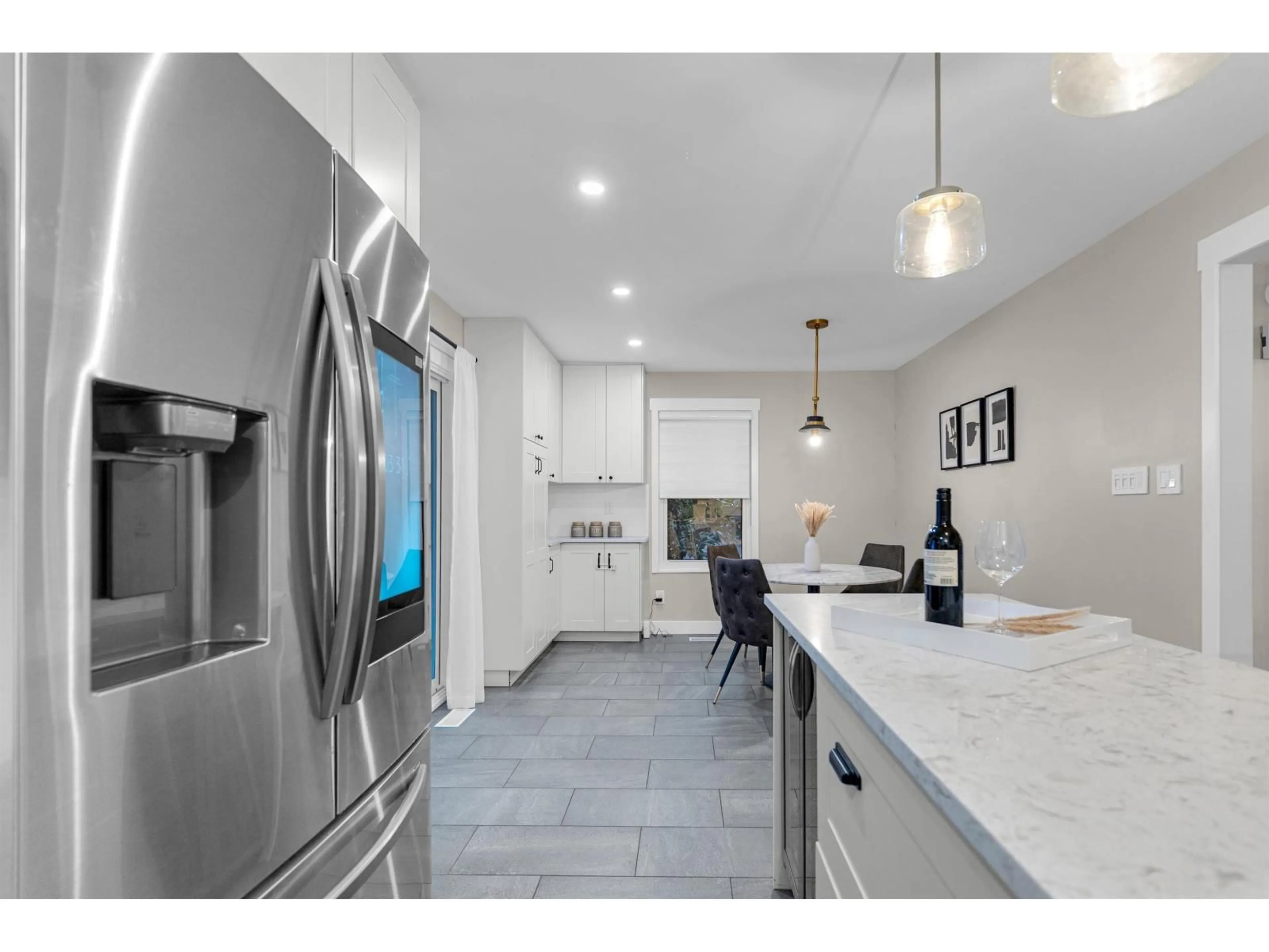 Open concept kitchen, ceramic/tile floor for 11585 ROYAL CRESCENT, Surrey British Columbia V3V6V5