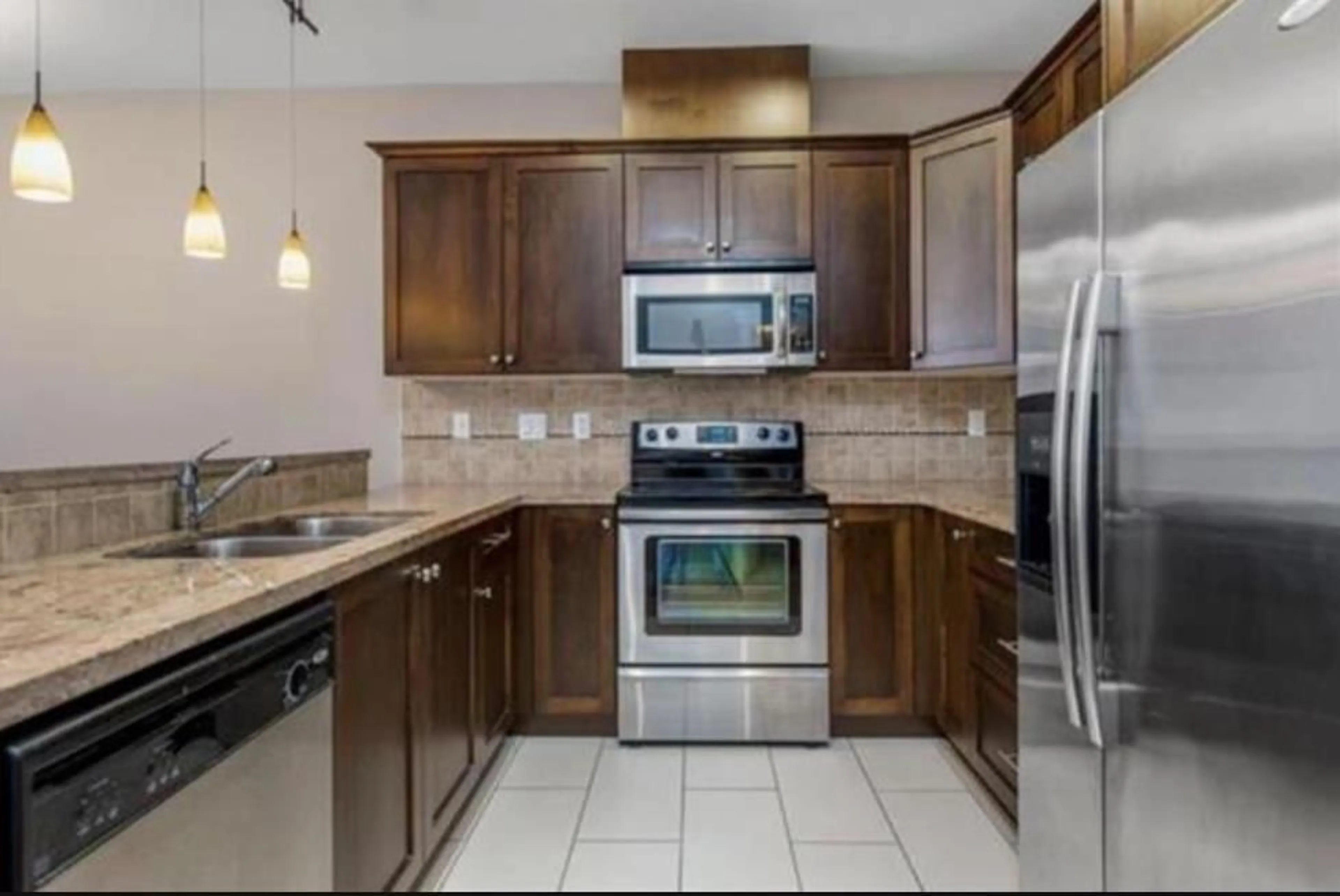 Standard kitchen, ceramic/tile floor for 603 - 14333 104 AVENUE, Surrey British Columbia V3T0E1