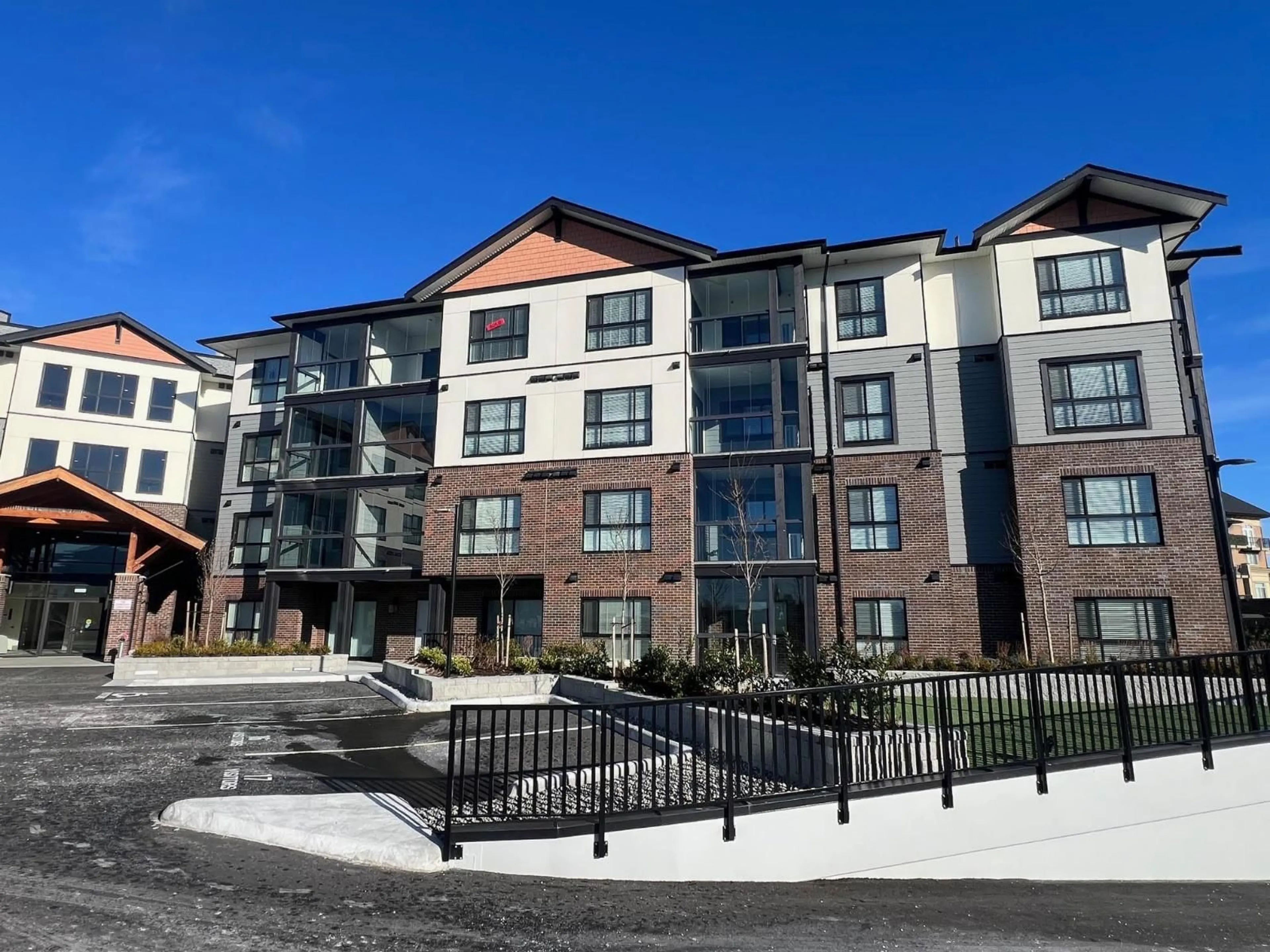 A pic from outside/outdoor area/front of a property/back of a property/a pic from drone, unknown for 202 - 8497 YOUNG ROAD, Chilliwack British Columbia V2P4P2