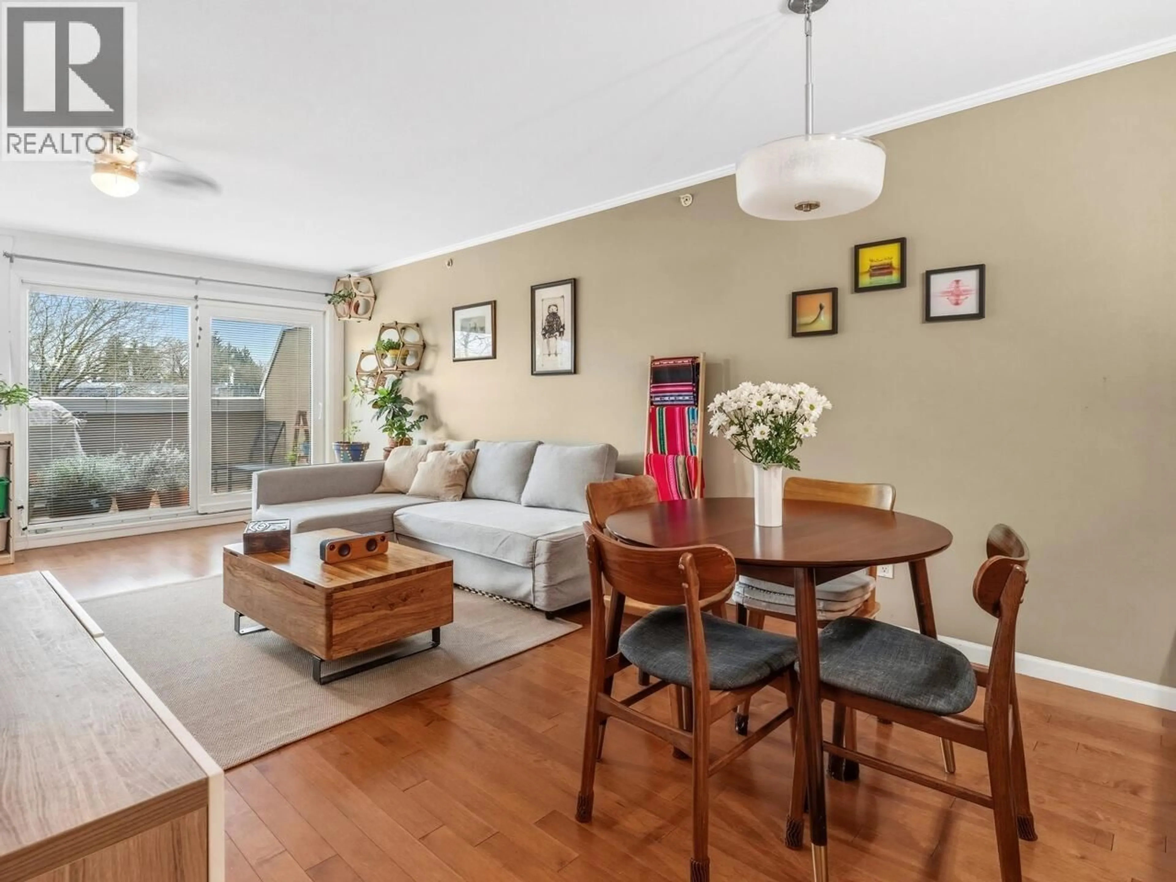 Living room with furniture, wood/laminate floor for 409 - 2161 12TH AVENUE, Vancouver British Columbia V6K4S7