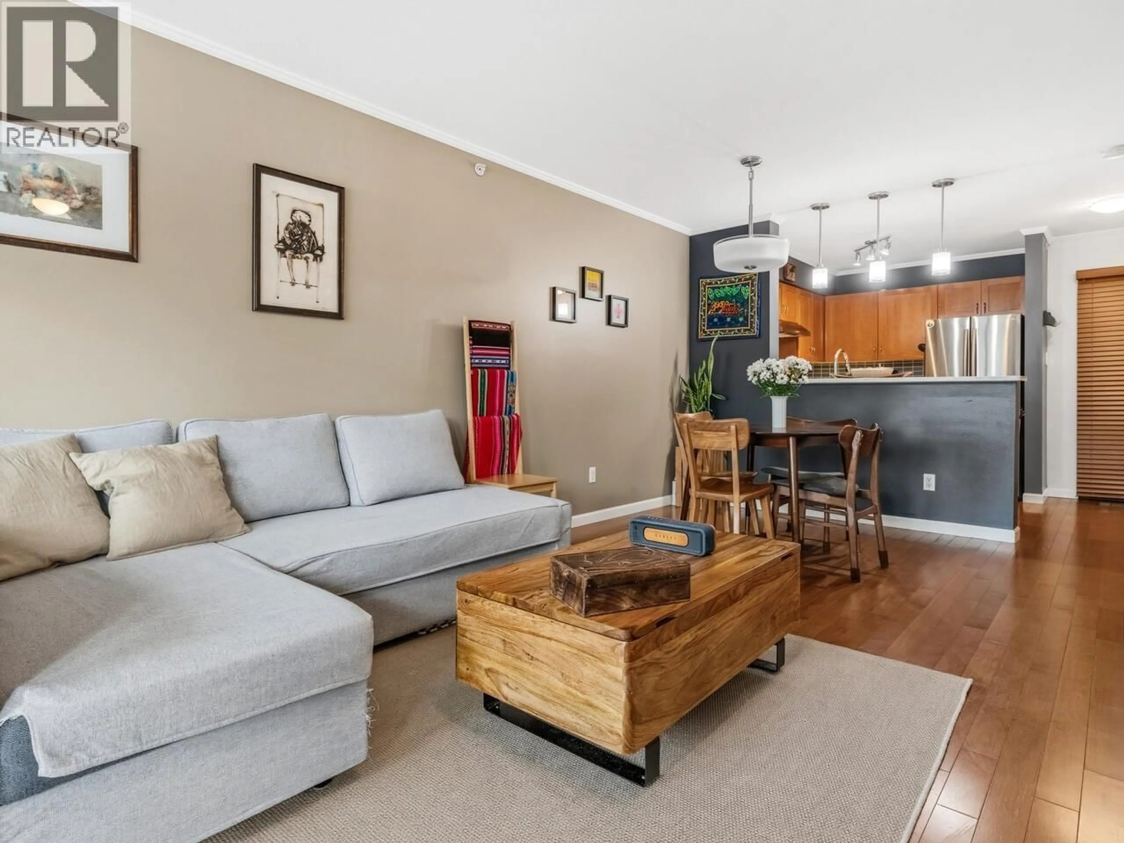 Living room with furniture, wood/laminate floor for 409 - 2161 12TH AVENUE, Vancouver British Columbia V6K4S7