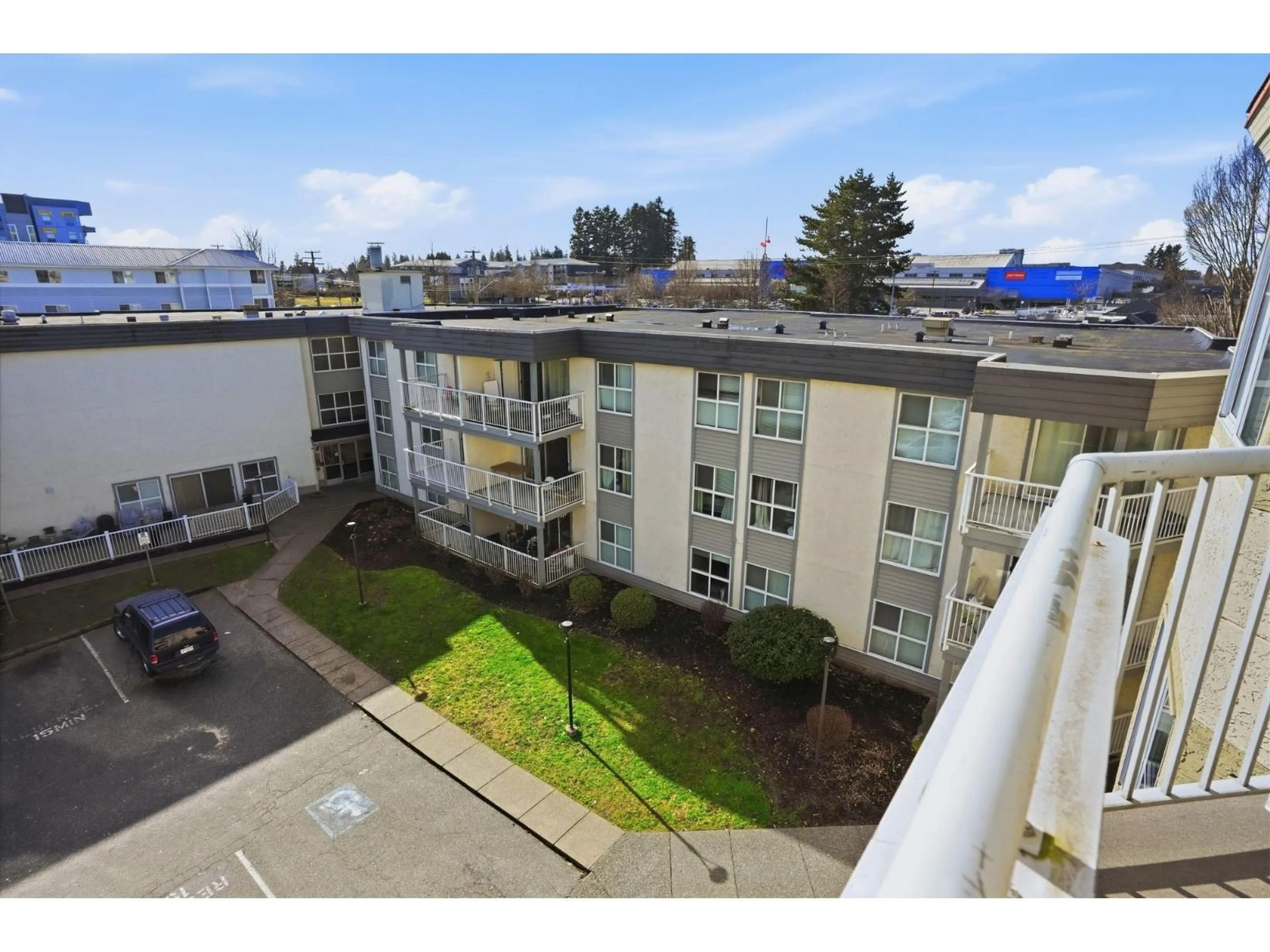A pic from outside/outdoor area/front of a property/back of a property/a pic from drone, city buildings view from balcony for 433 - 32830 GEORGE FERGUSON WAY, Abbotsford British Columbia V2S7K1