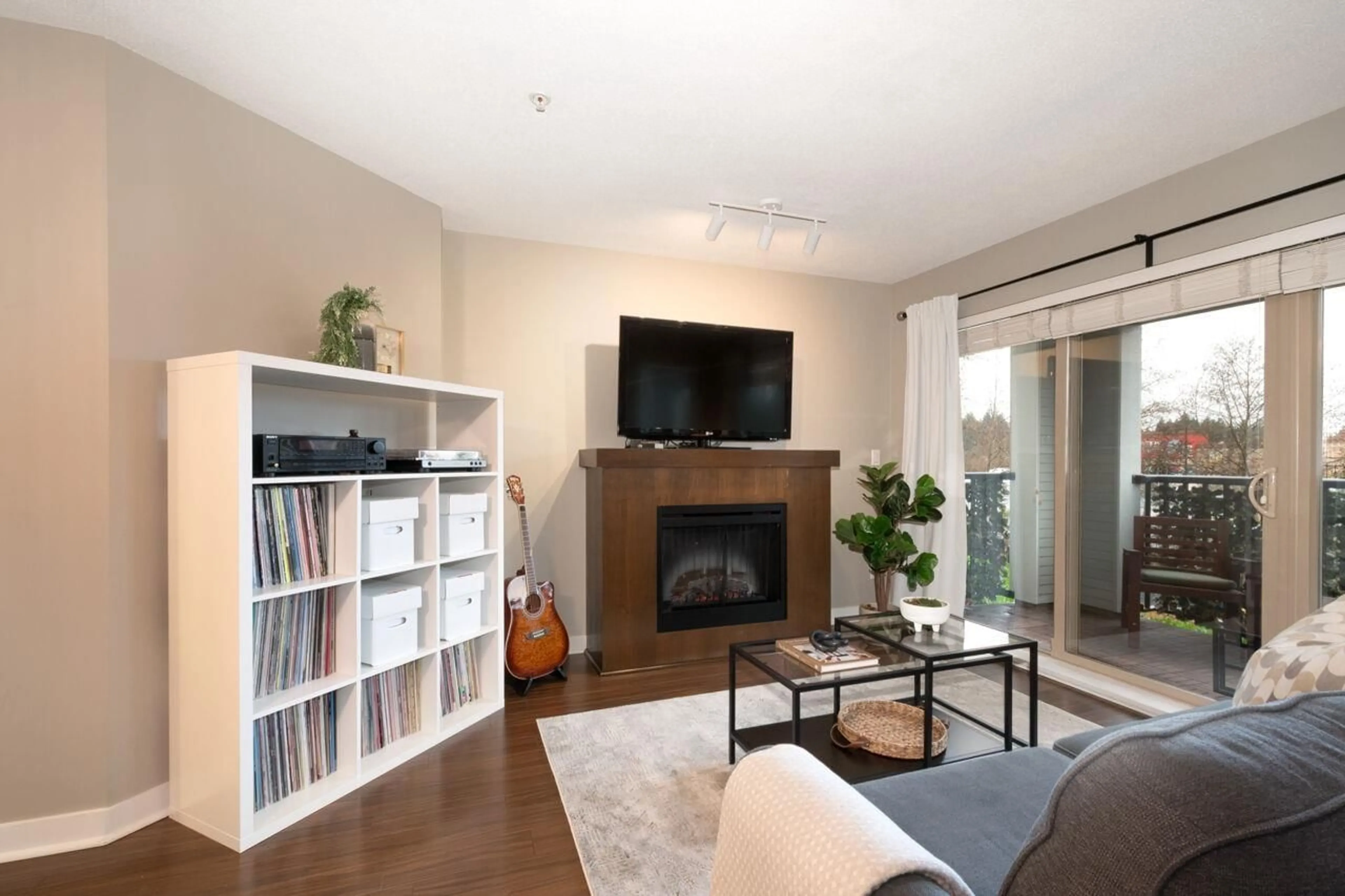 Living room with furniture, wood/laminate floor for D207 - 8929 202 STREET, Langley British Columbia V1M0B4