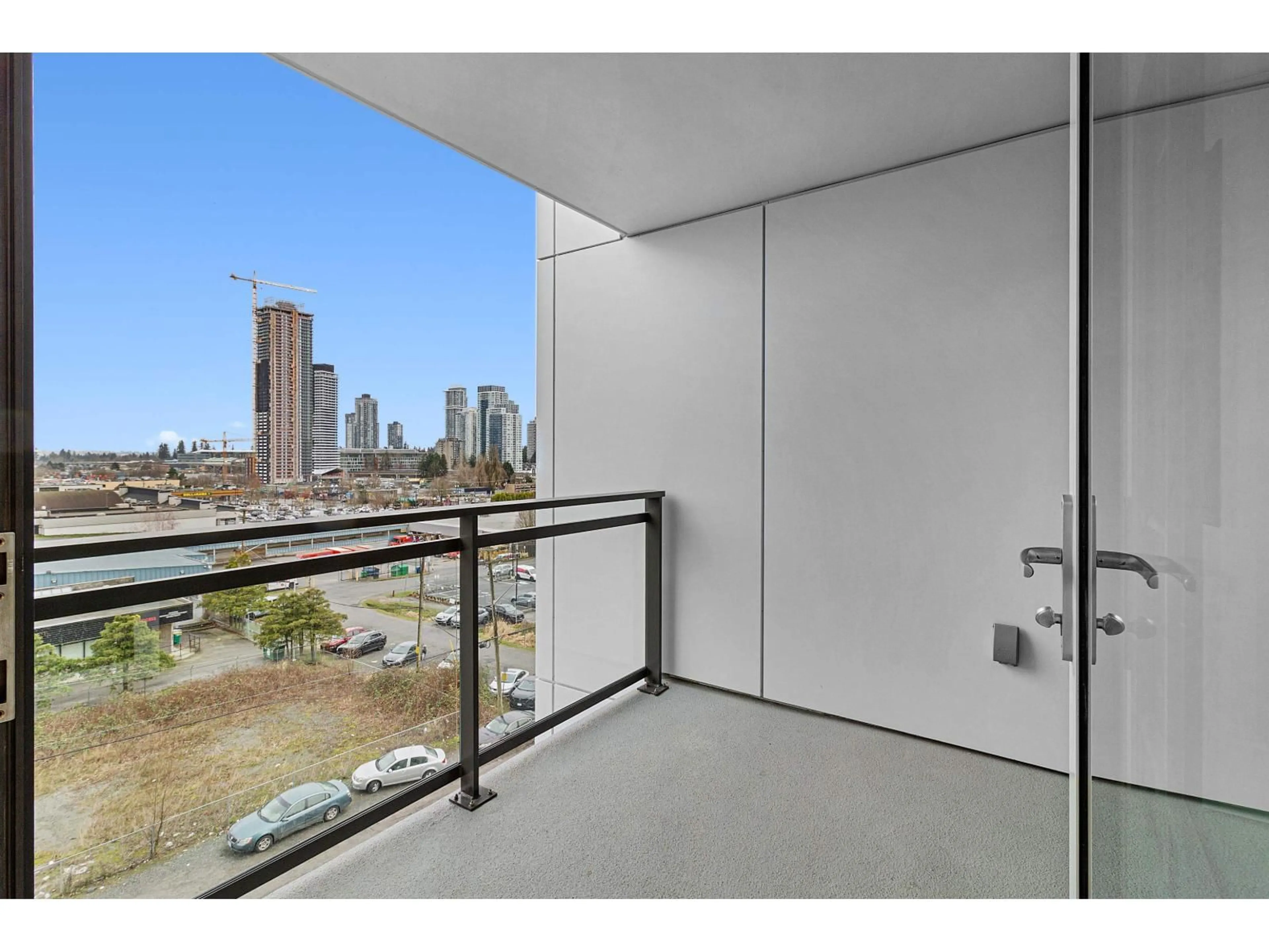 Balcony in the apartment, city buildings view from balcony for 504 - 13675 107A AVENUE, Surrey British Columbia V3T2H3
