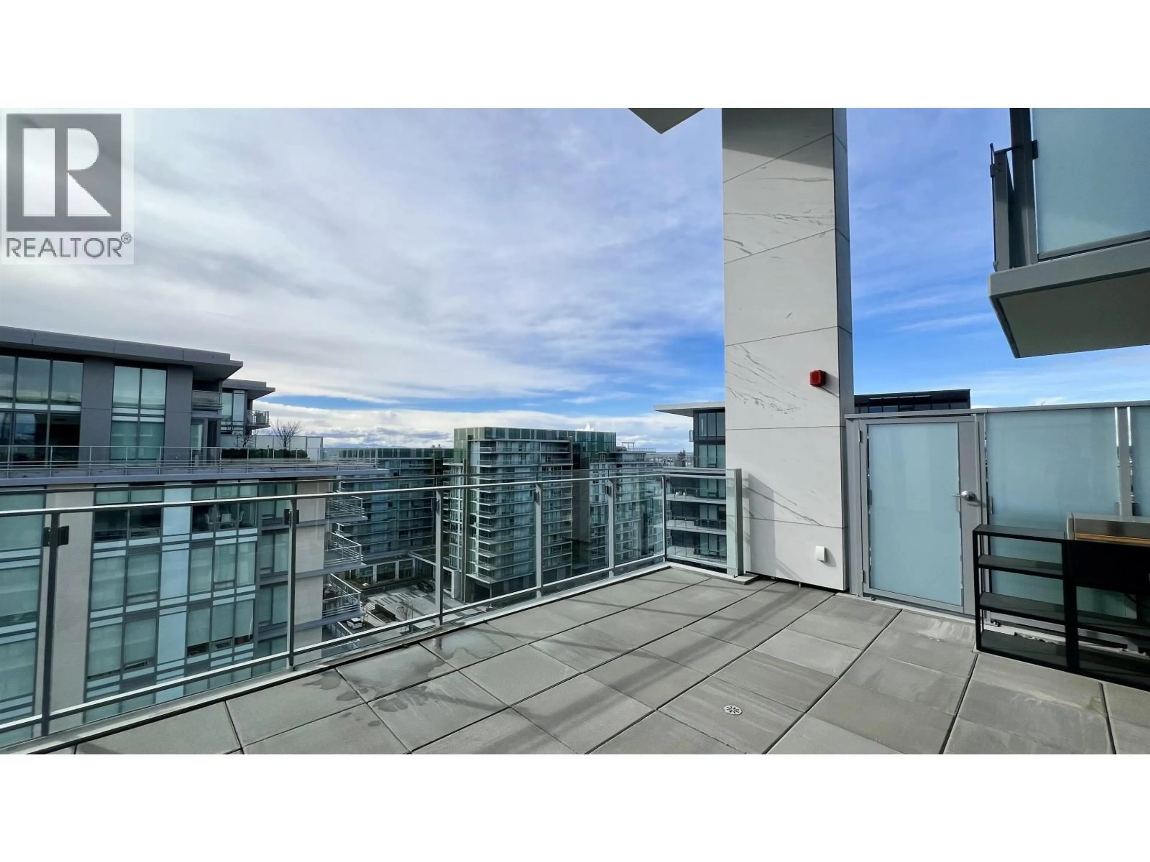 Balcony in the apartment, city buildings view from balcony for 1206 - 6855 PEARSON WAY, Richmond British Columbia V7C0E9