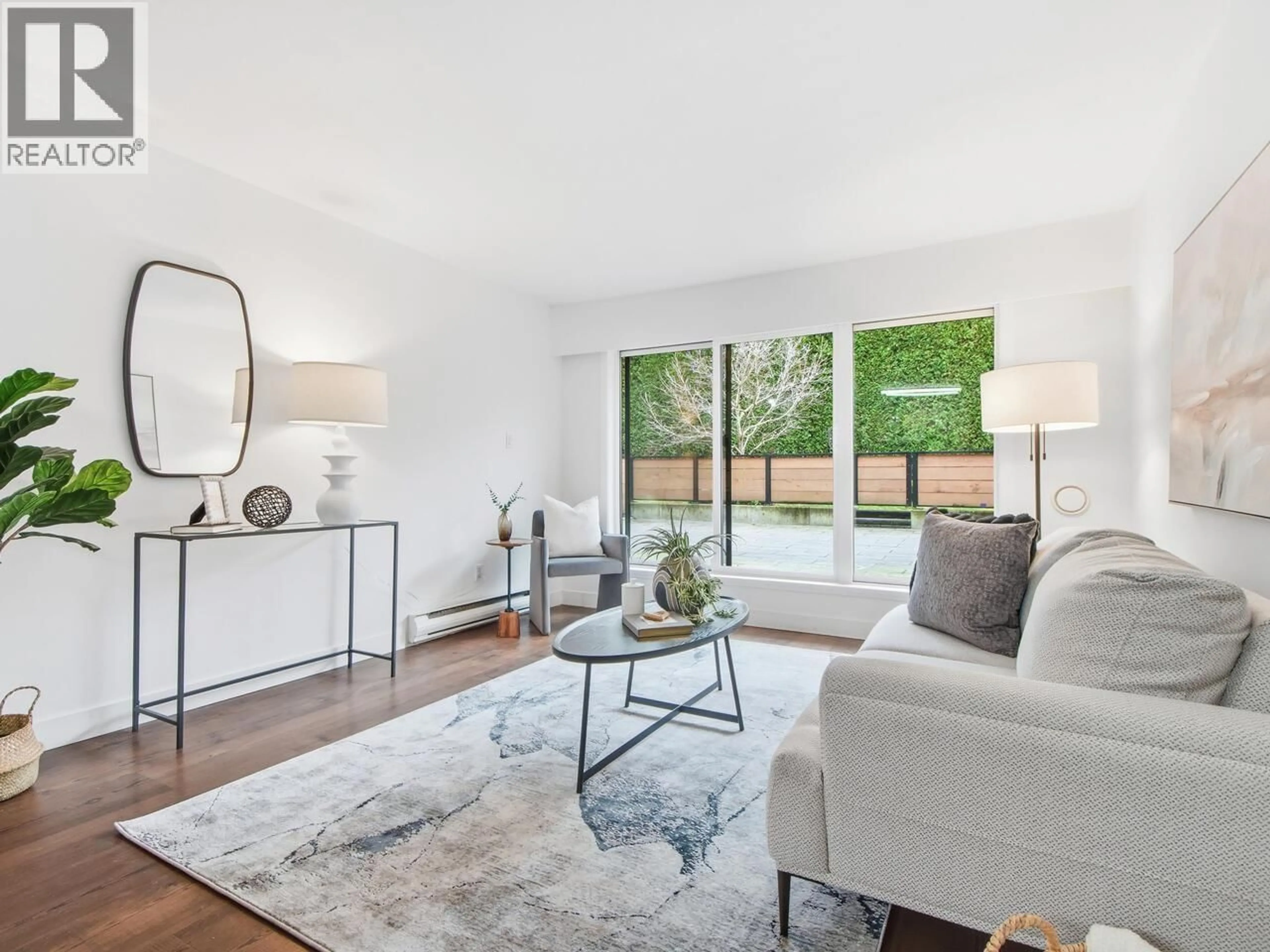 Living room with furniture, unknown for 202 - 215 MOWAT STREET, New Westminster British Columbia V3M4B1