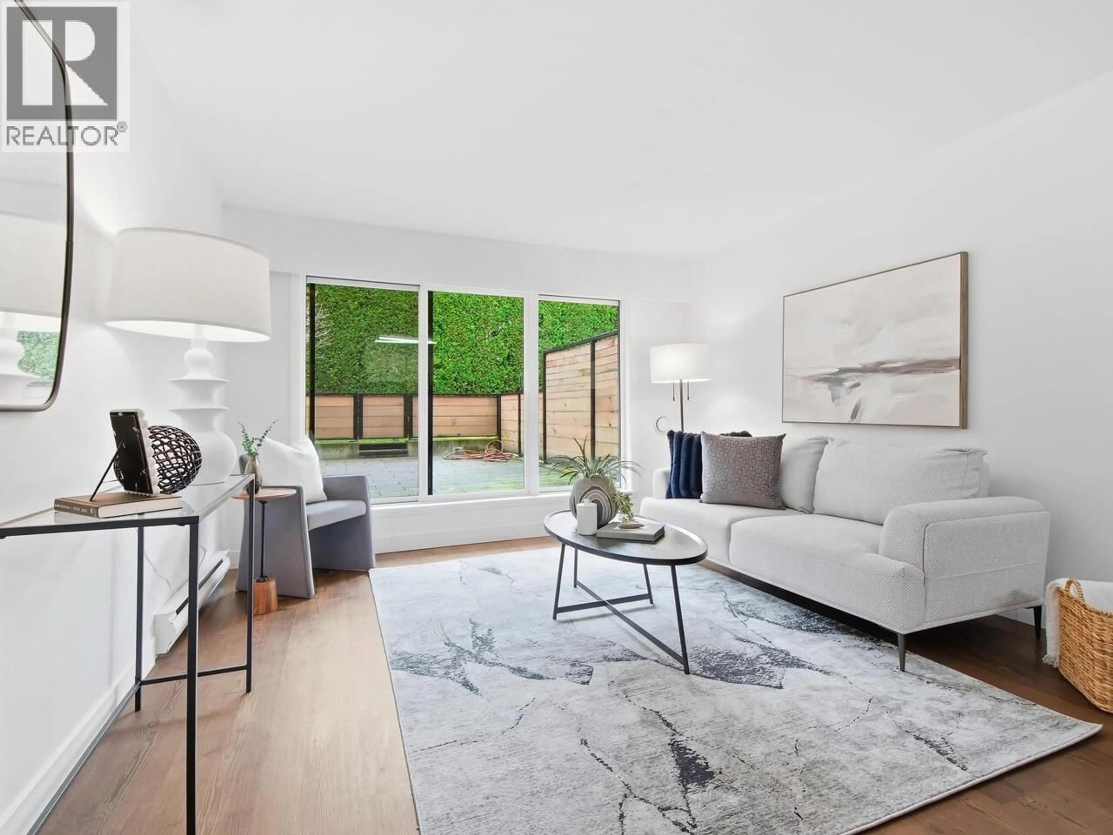 Living room with furniture, unknown for 202 - 215 MOWAT STREET, New Westminster British Columbia V3M4B1