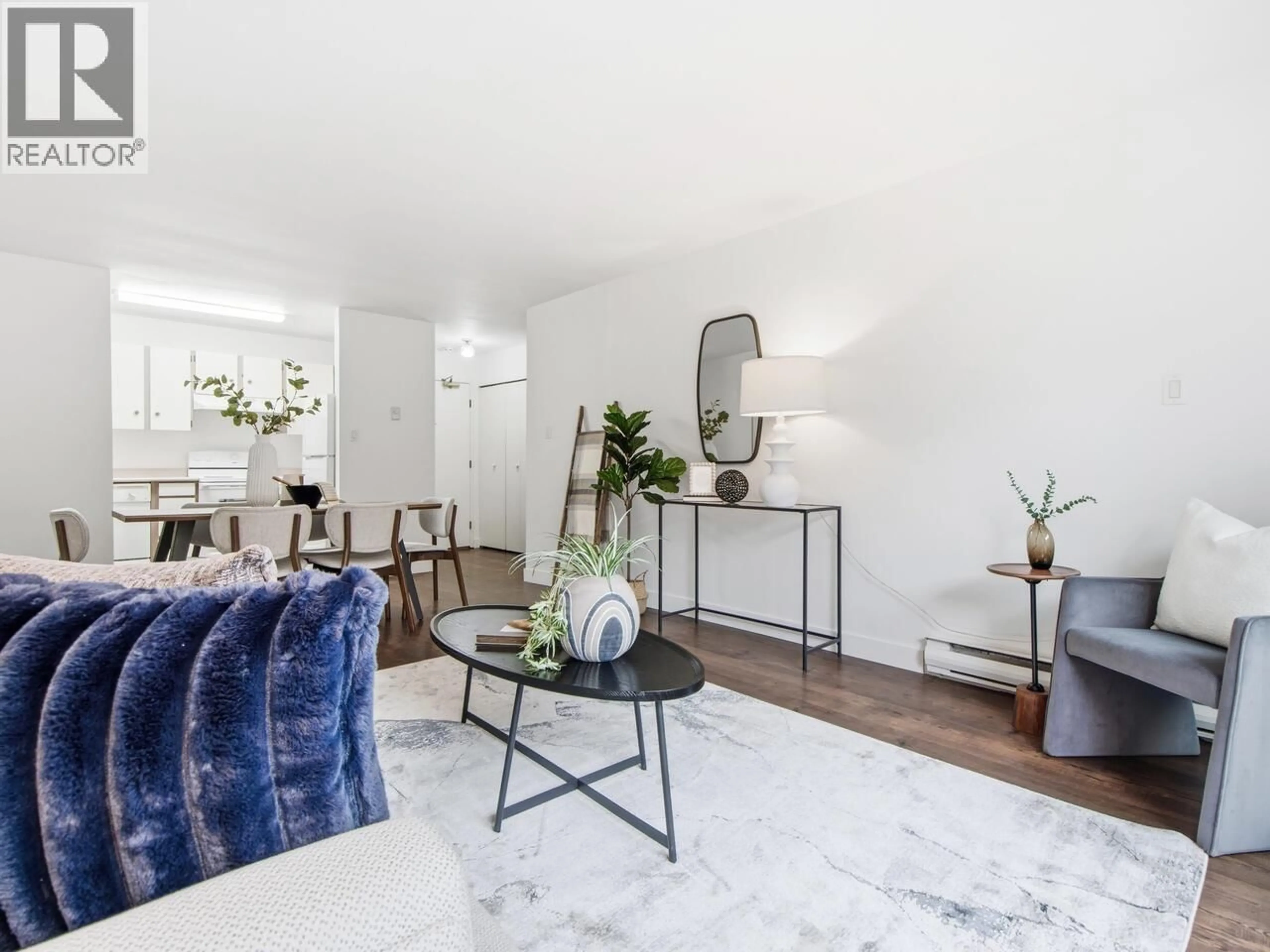 Living room with furniture, unknown for 202 - 215 MOWAT STREET, New Westminster British Columbia V3M4B1