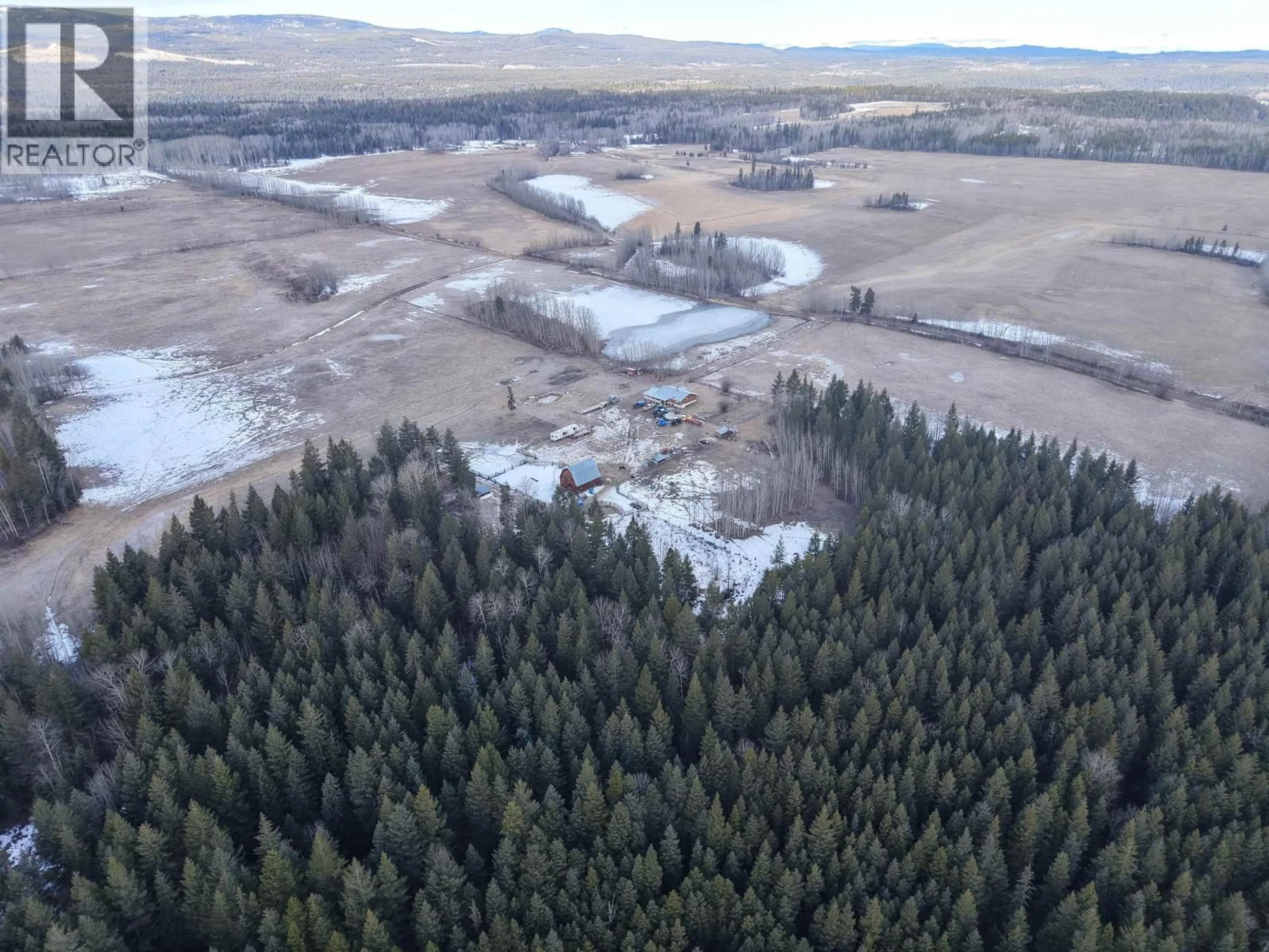 A pic from outside/outdoor area/front of a property/back of a property/a pic from drone, forest/trees view for 887 PARKER ROAD, Quesnel British Columbia V2J6R2