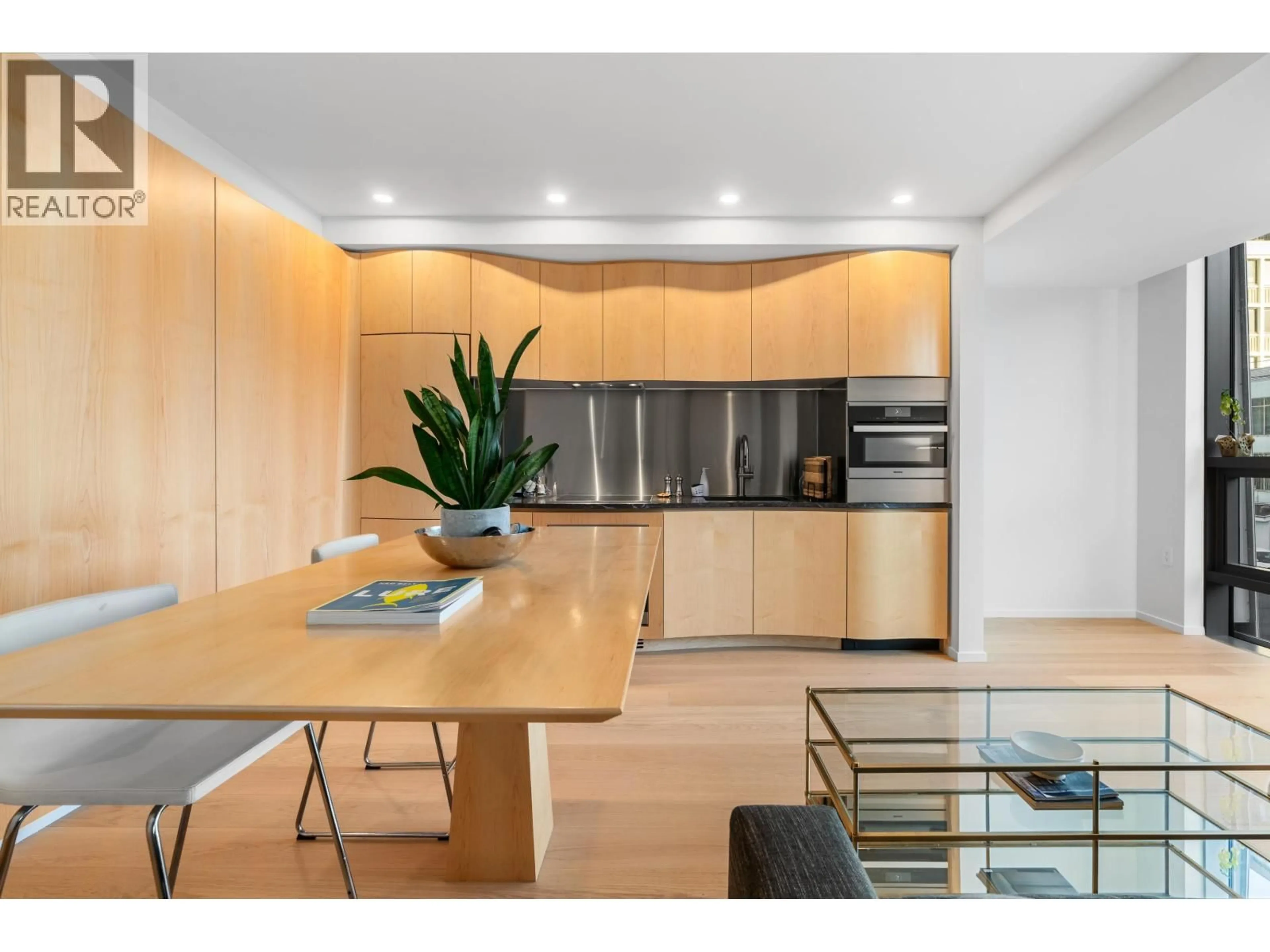 Open concept kitchen, wood/laminate floor for 501 - 1568 ALBERNI STREET, Vancouver British Columbia V6G0E3