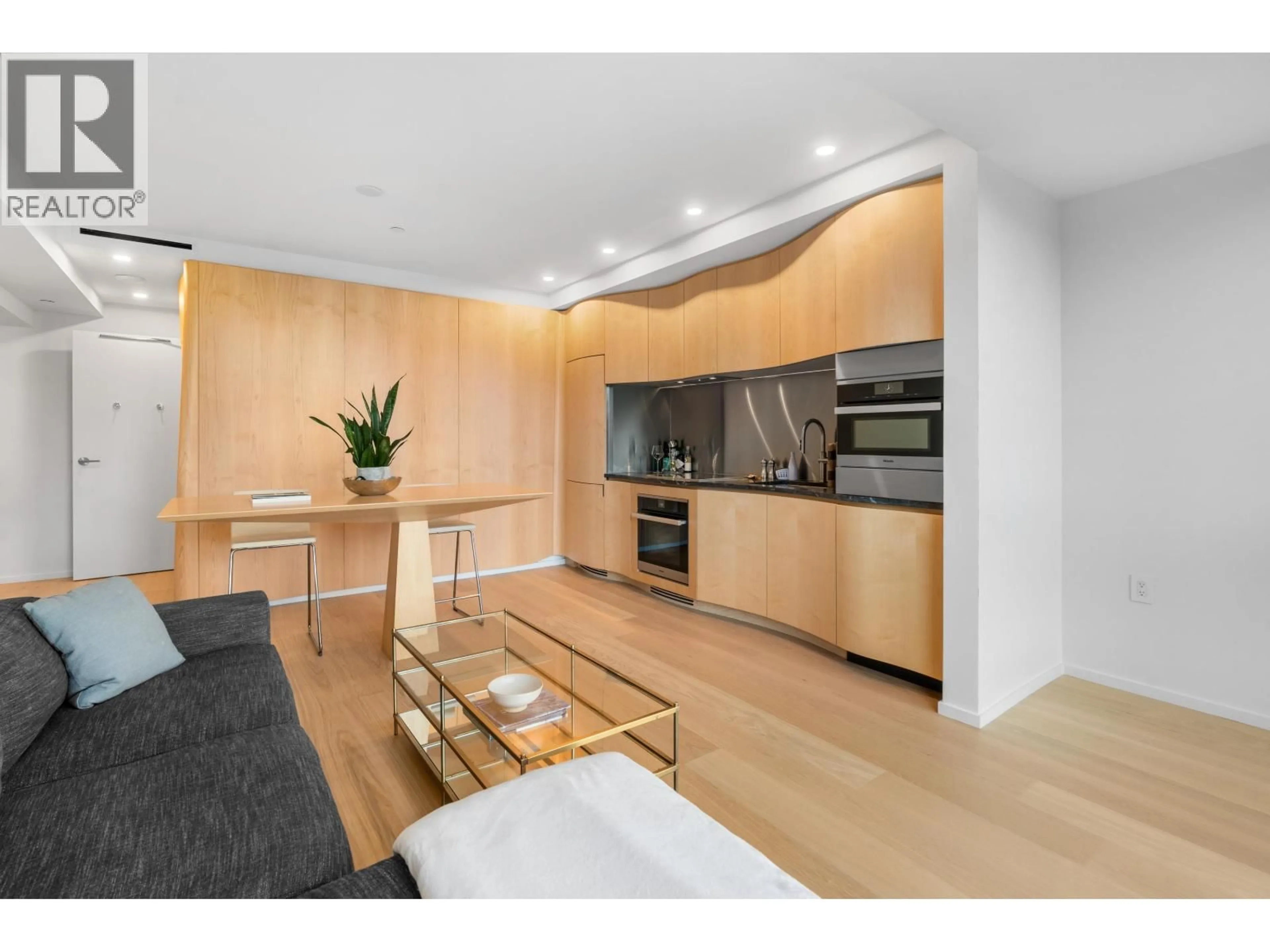 Open concept kitchen, wood/laminate floor for 501 - 1568 ALBERNI STREET, Vancouver British Columbia V6G0E3