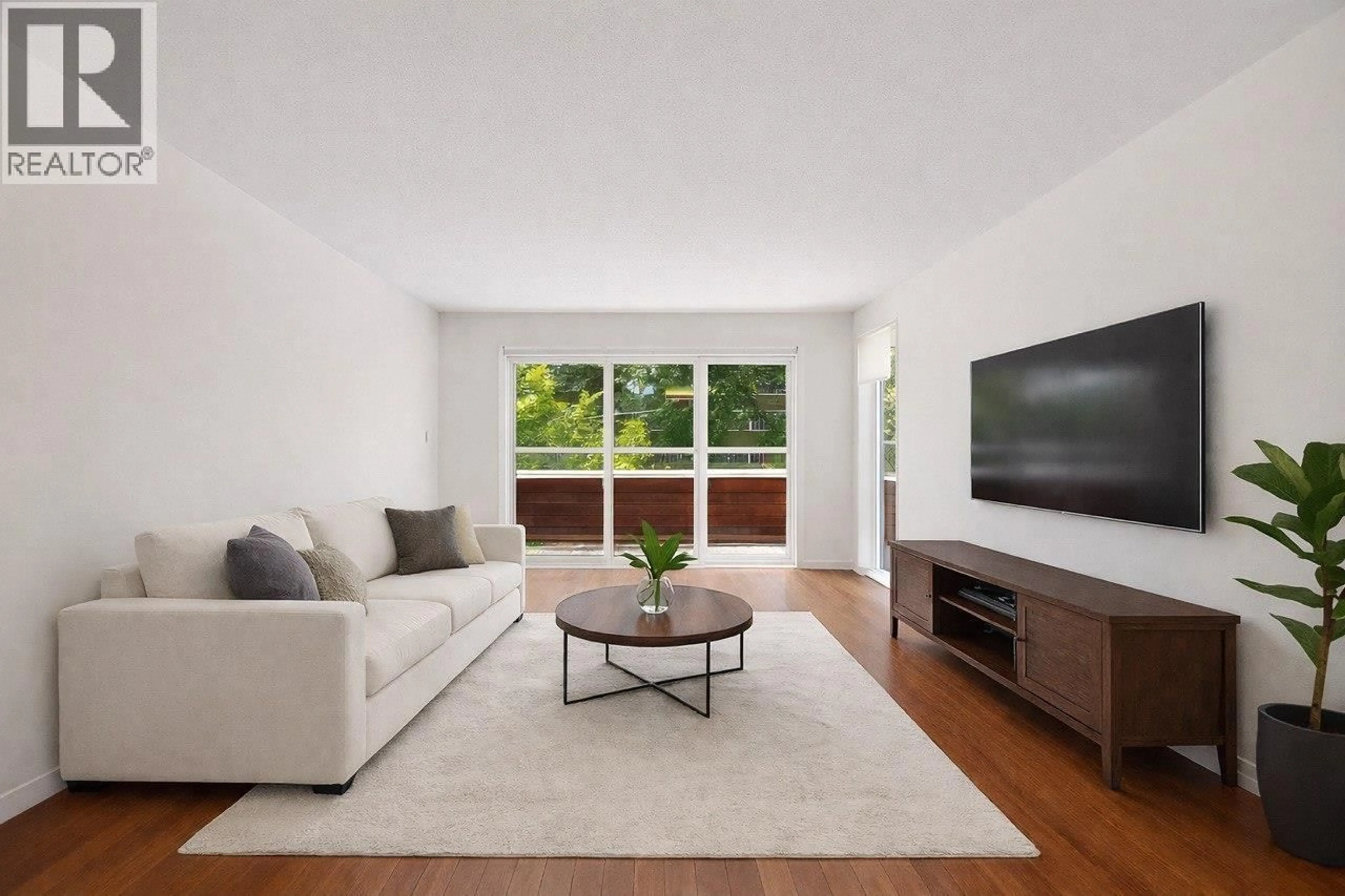 Living room with furniture, unknown for 202 - 250 1ST STREET, North Vancouver British Columbia V7M1B4