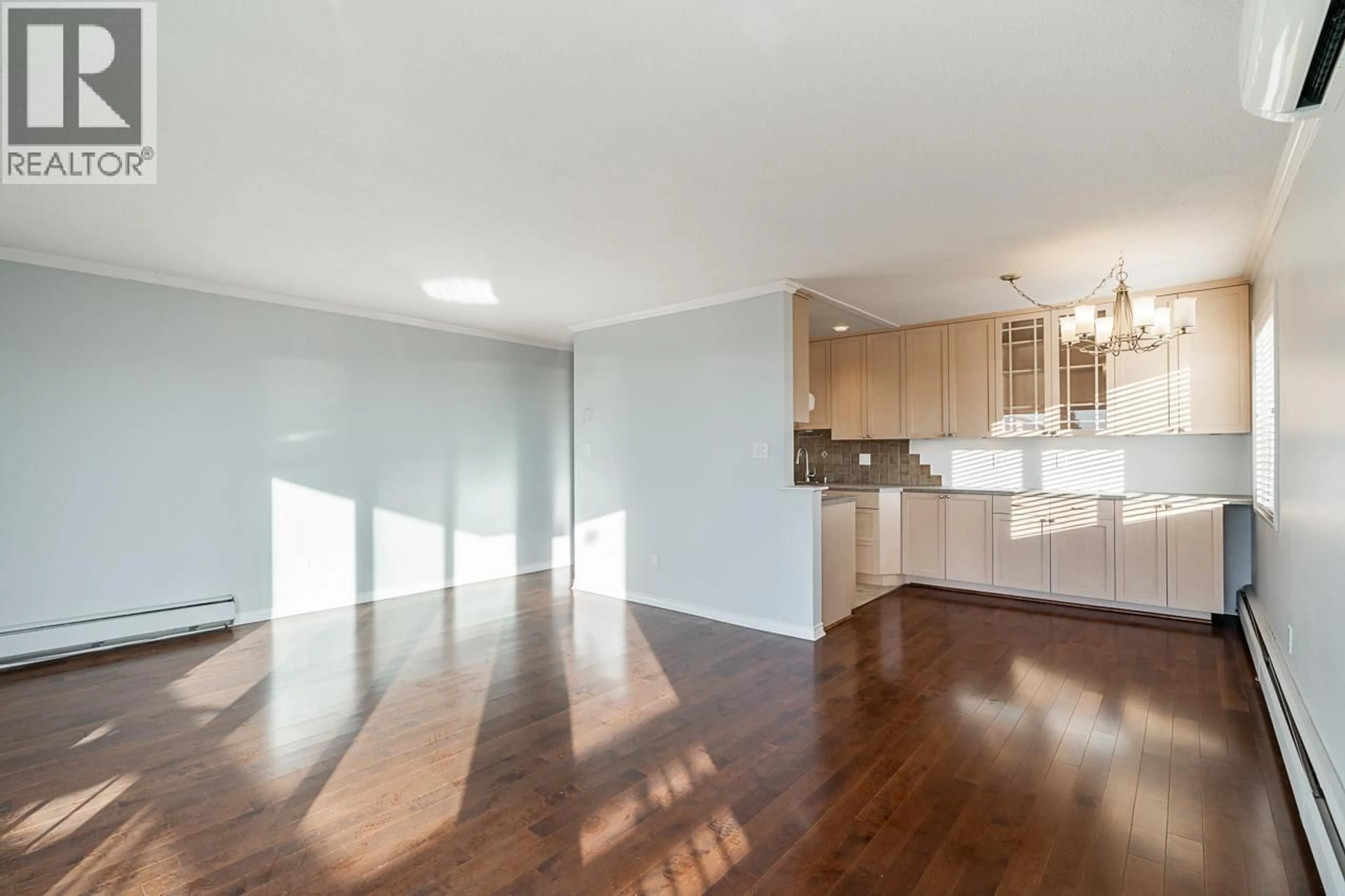 Open concept kitchen, wood/laminate floor for 318 - 3080 LONSDALE AVENUE, North Vancouver British Columbia V7N3J5