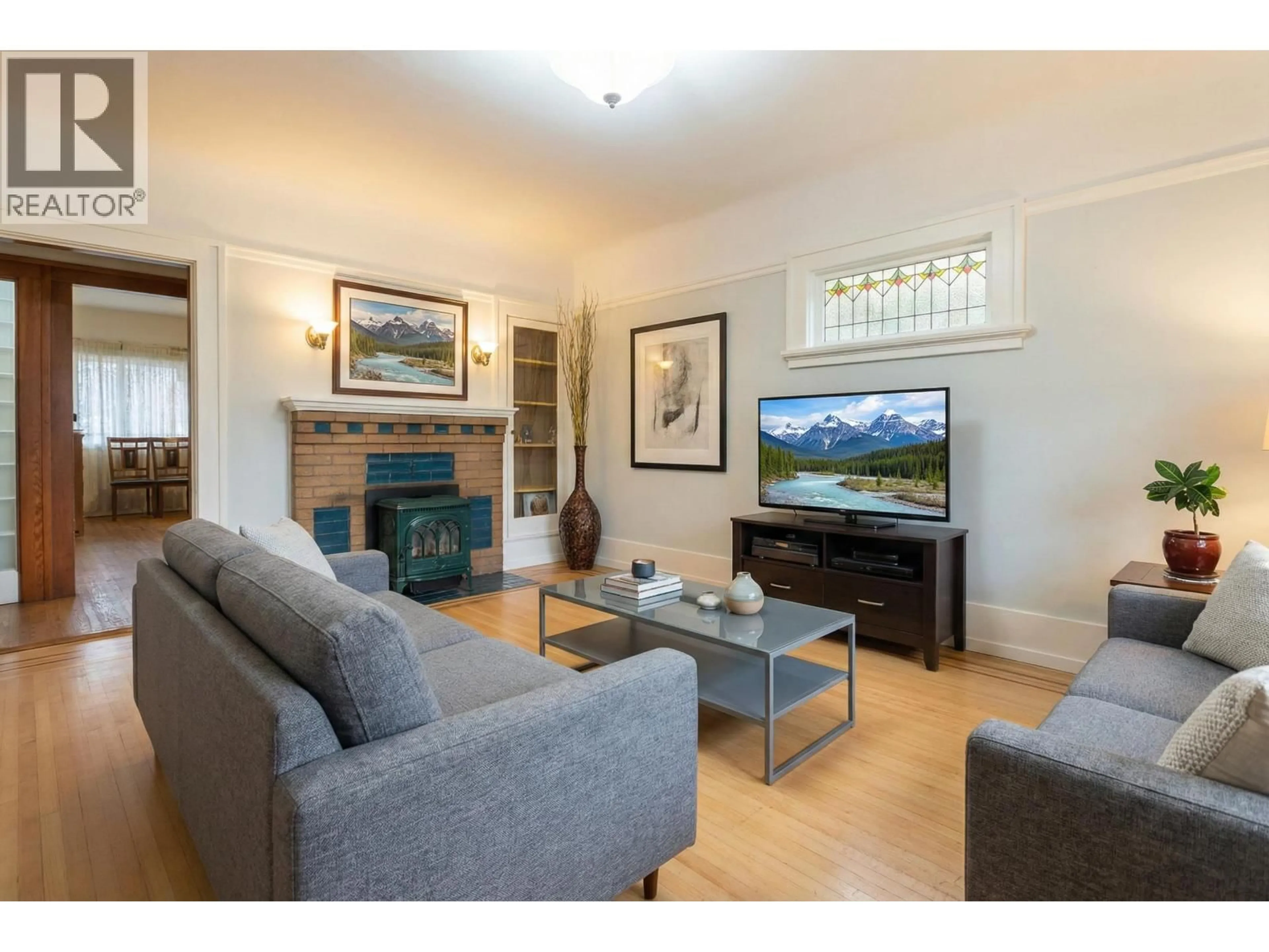 Living room with furniture, wood/laminate floor for 2223 GRAVELEY STREET, Vancouver British Columbia V5L3C1