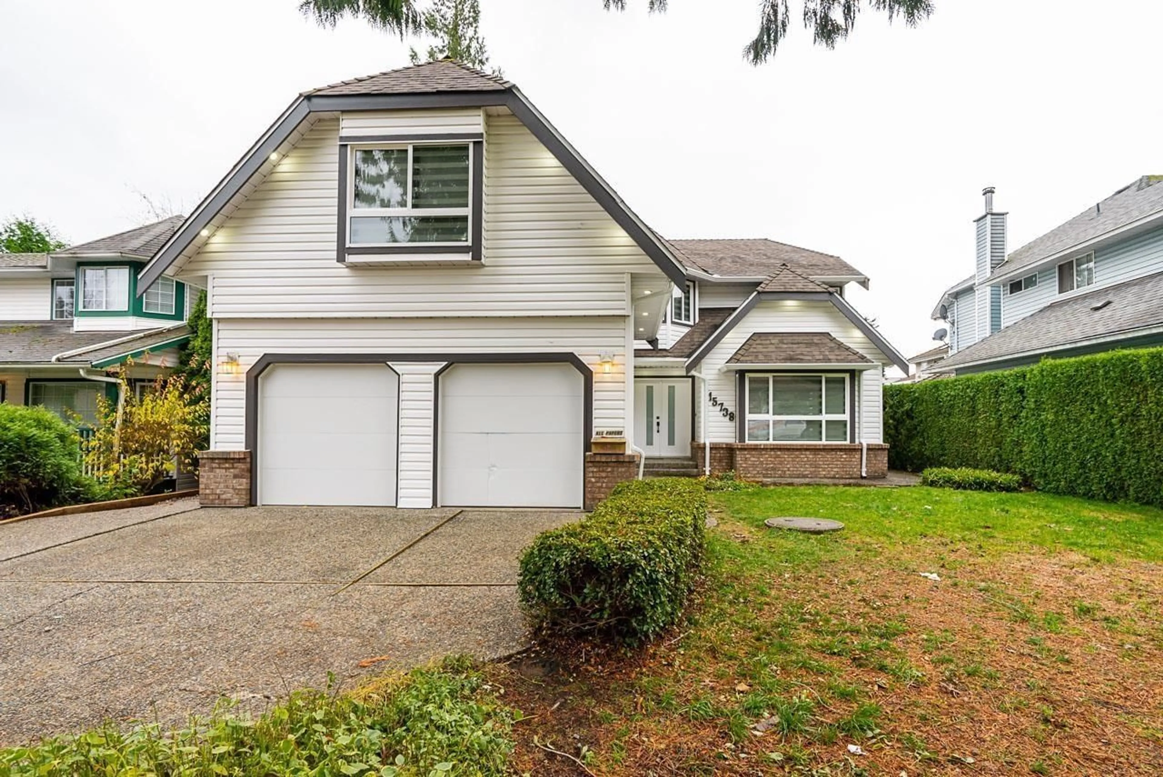 Home with vinyl exterior material, street for 15738 97 AVENUE, Surrey British Columbia V4N2T3