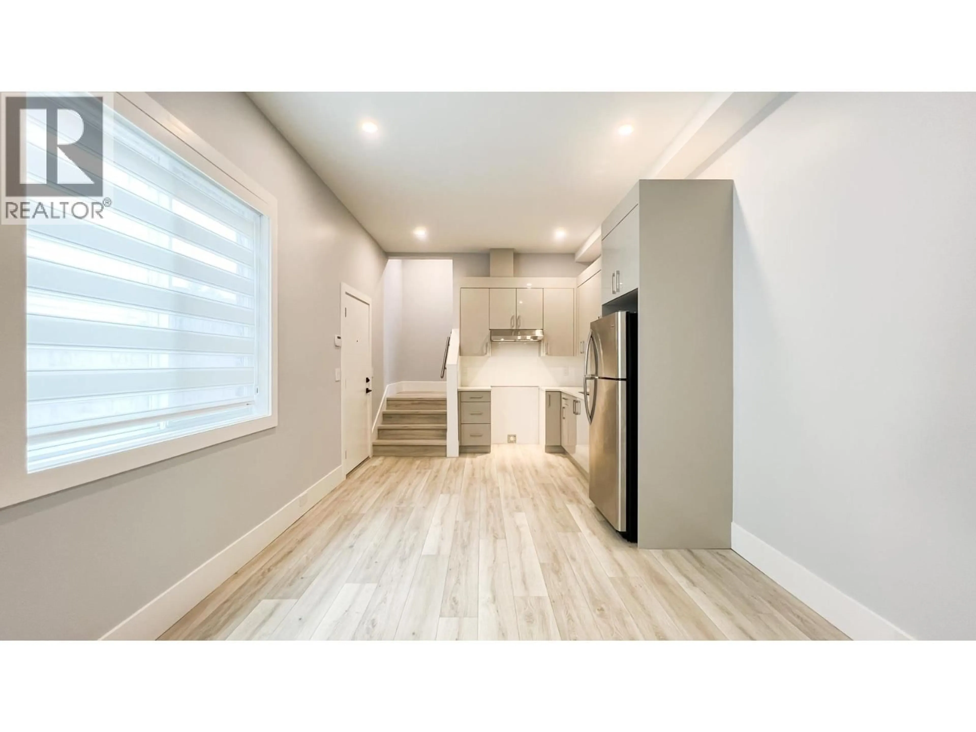 Open concept kitchen, wood/laminate floor for 5103 LINDEN DRIVE, Delta British Columbia V4K3A6