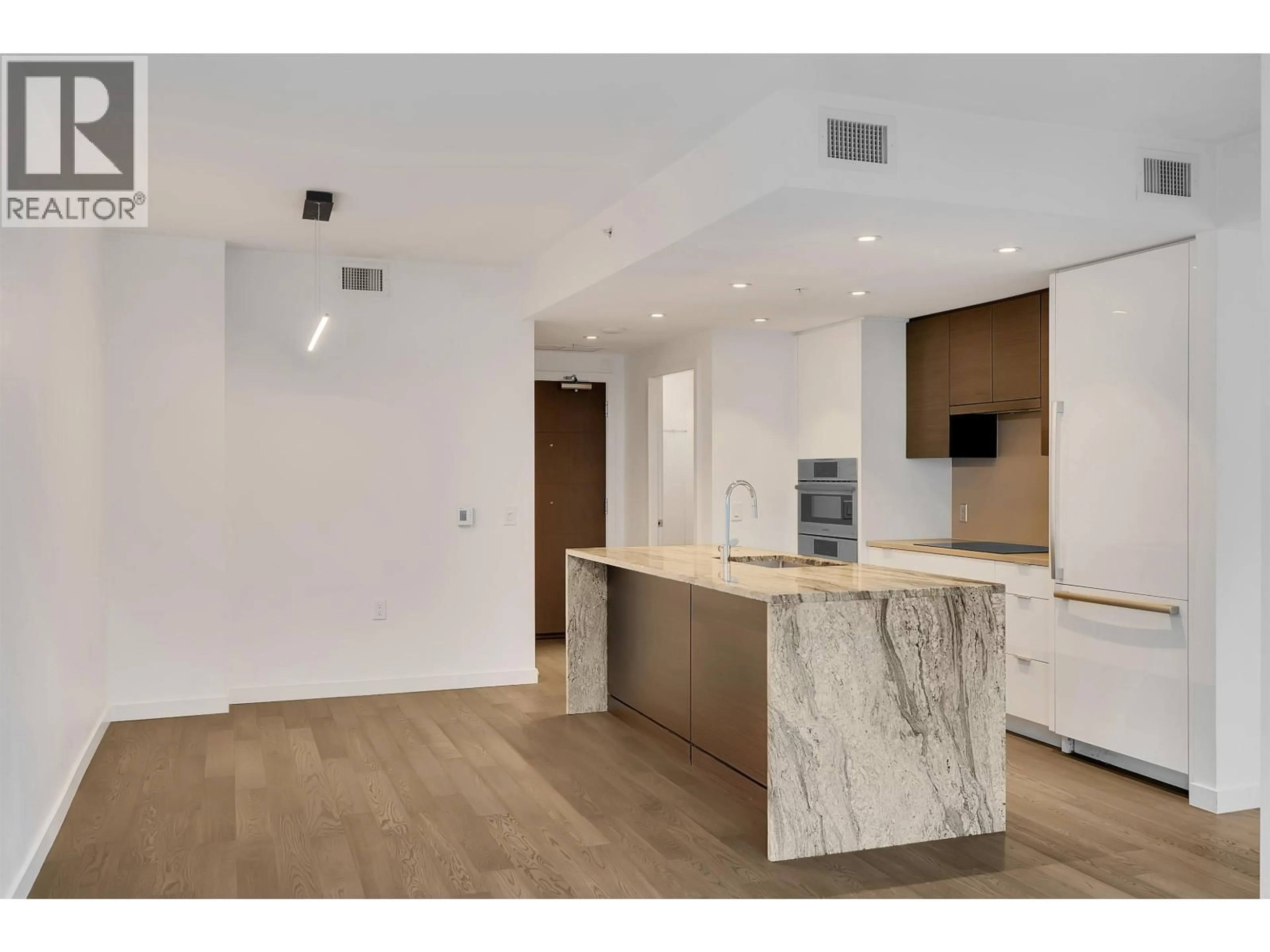 Open concept kitchen, unknown for 102 - 1688 PULLMAN PORTER STREET, Vancouver British Columbia V6A0H3