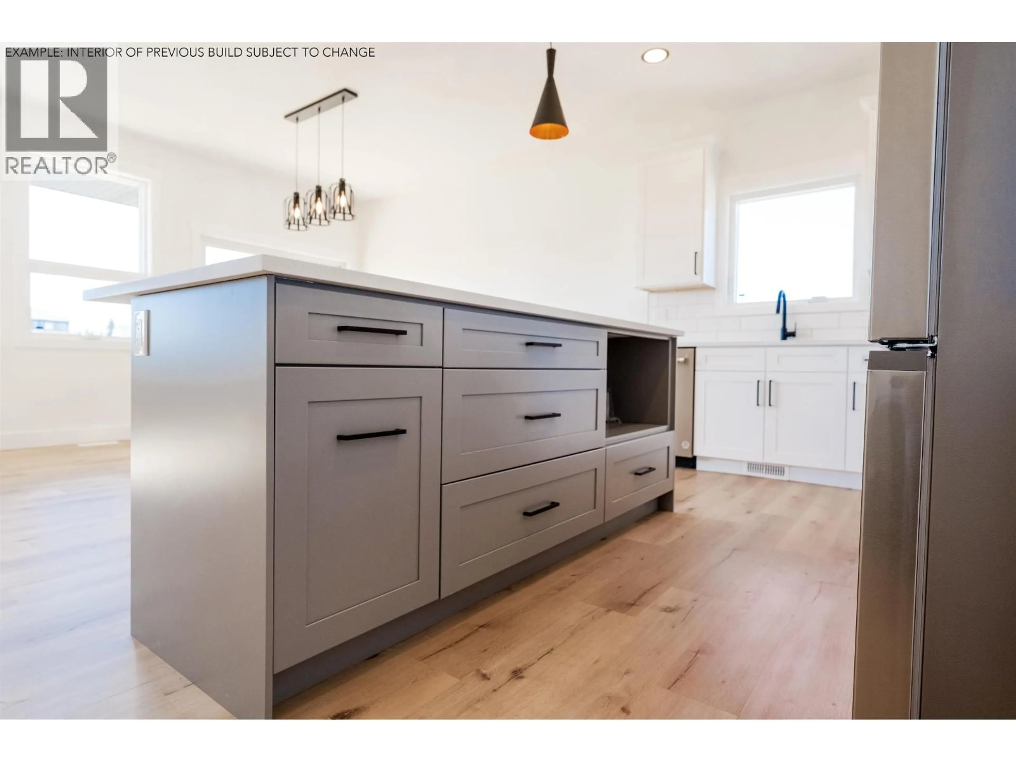 Open concept kitchen, wood/laminate floor for 11604 102A STREET, Fort St. John British Columbia V1J0P8