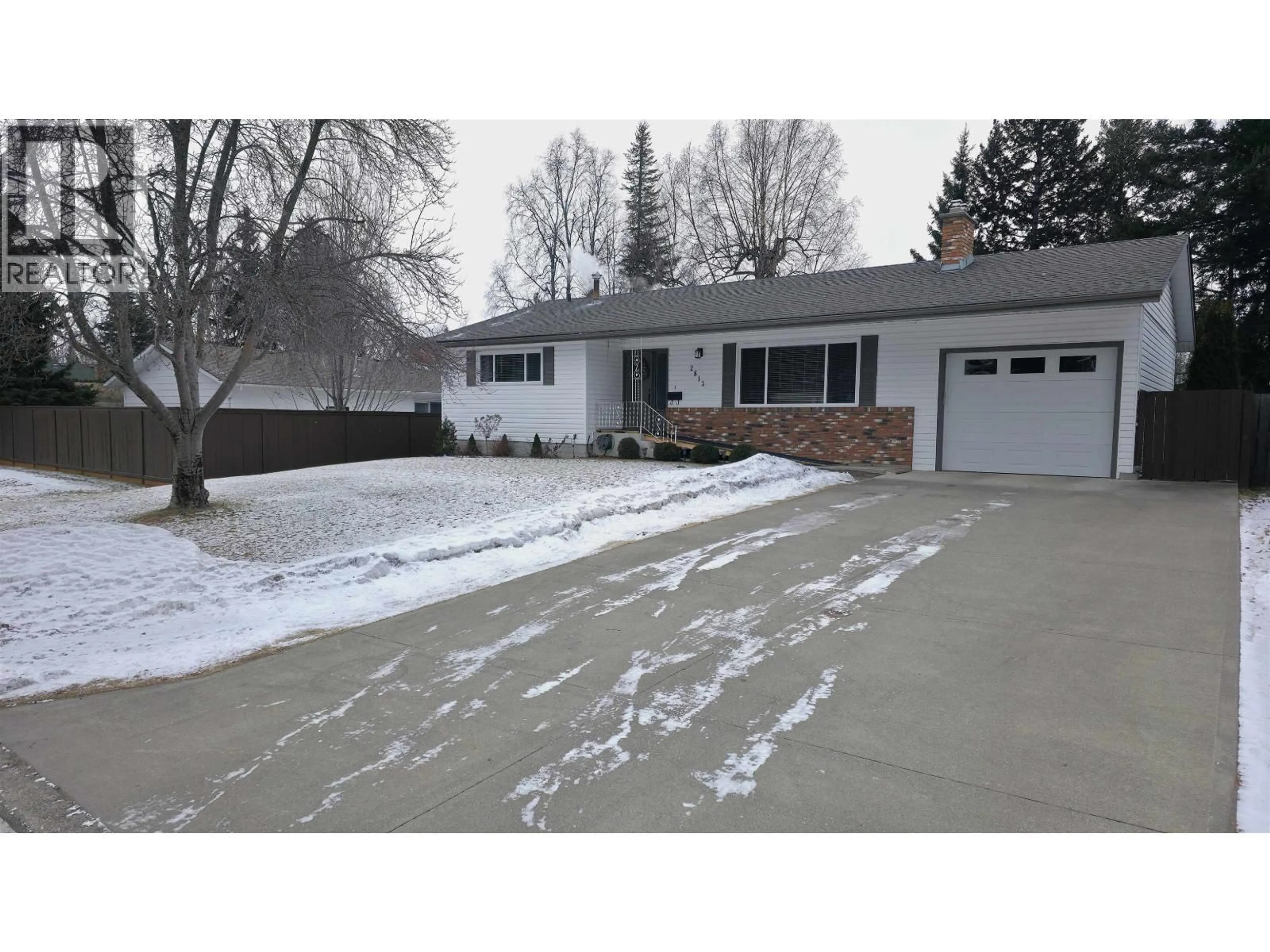 Home with vinyl exterior material, street for 2813 MCGILL CRESCENT, Prince George British Columbia V2N2M7