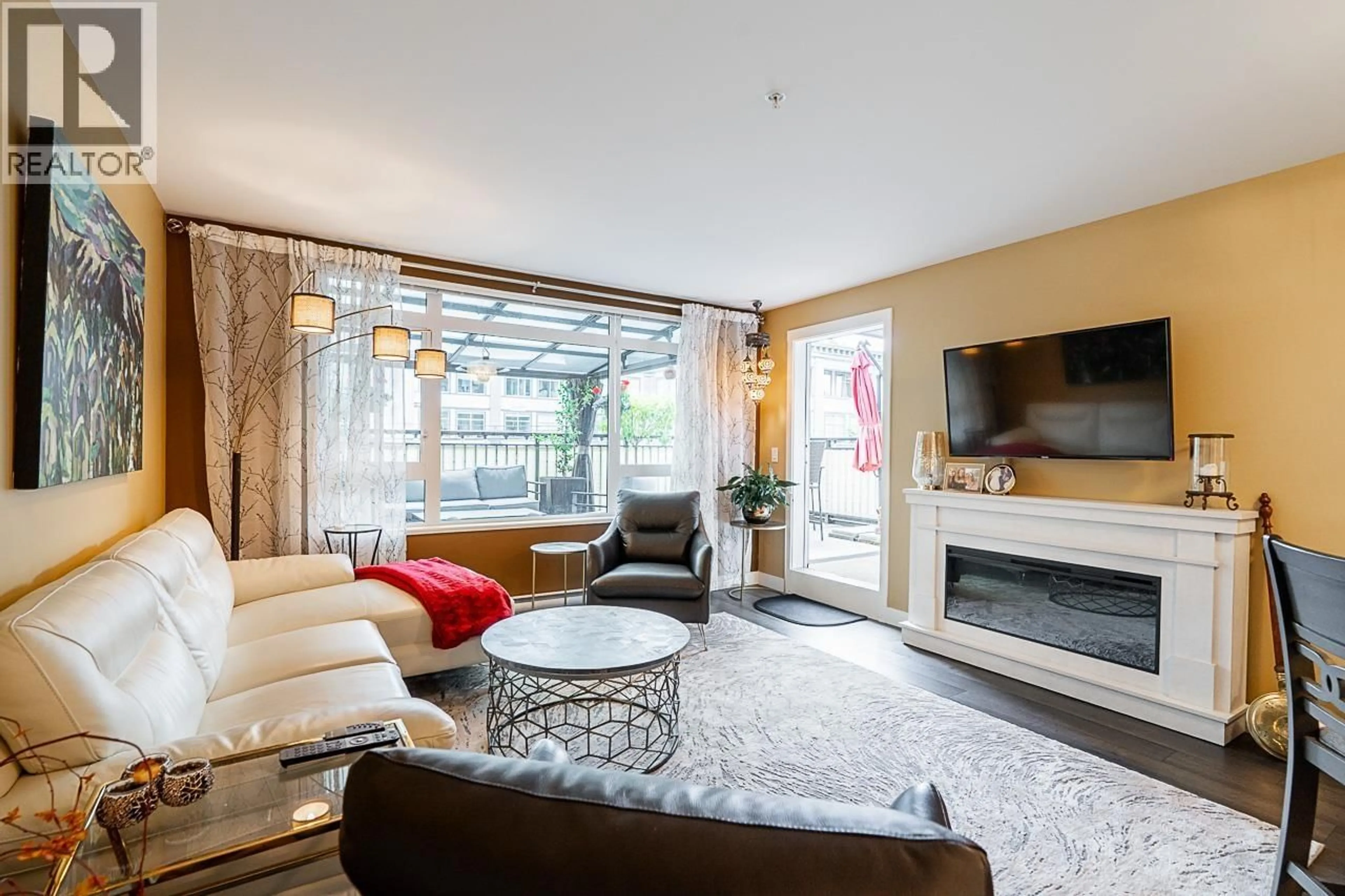 Living room with furniture, unknown for 221 - 2525 CLARKE STREET, Port Moody British Columbia V3H0J3