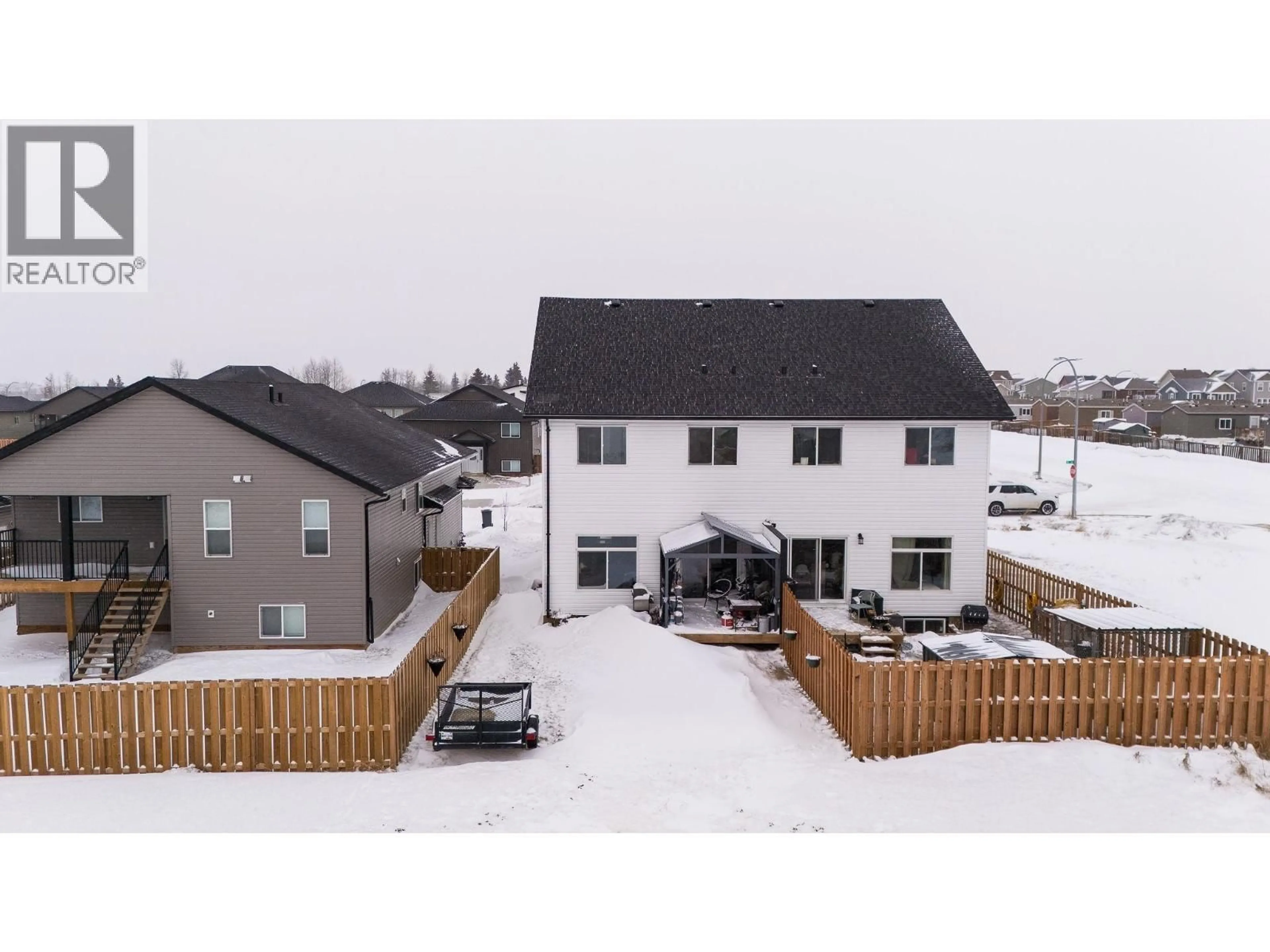 A pic from outside/outdoor area/front of a property/back of a property/a pic from drone, unknown for 8423 81 STREET, Fort St. John British Columbia V1J0P4