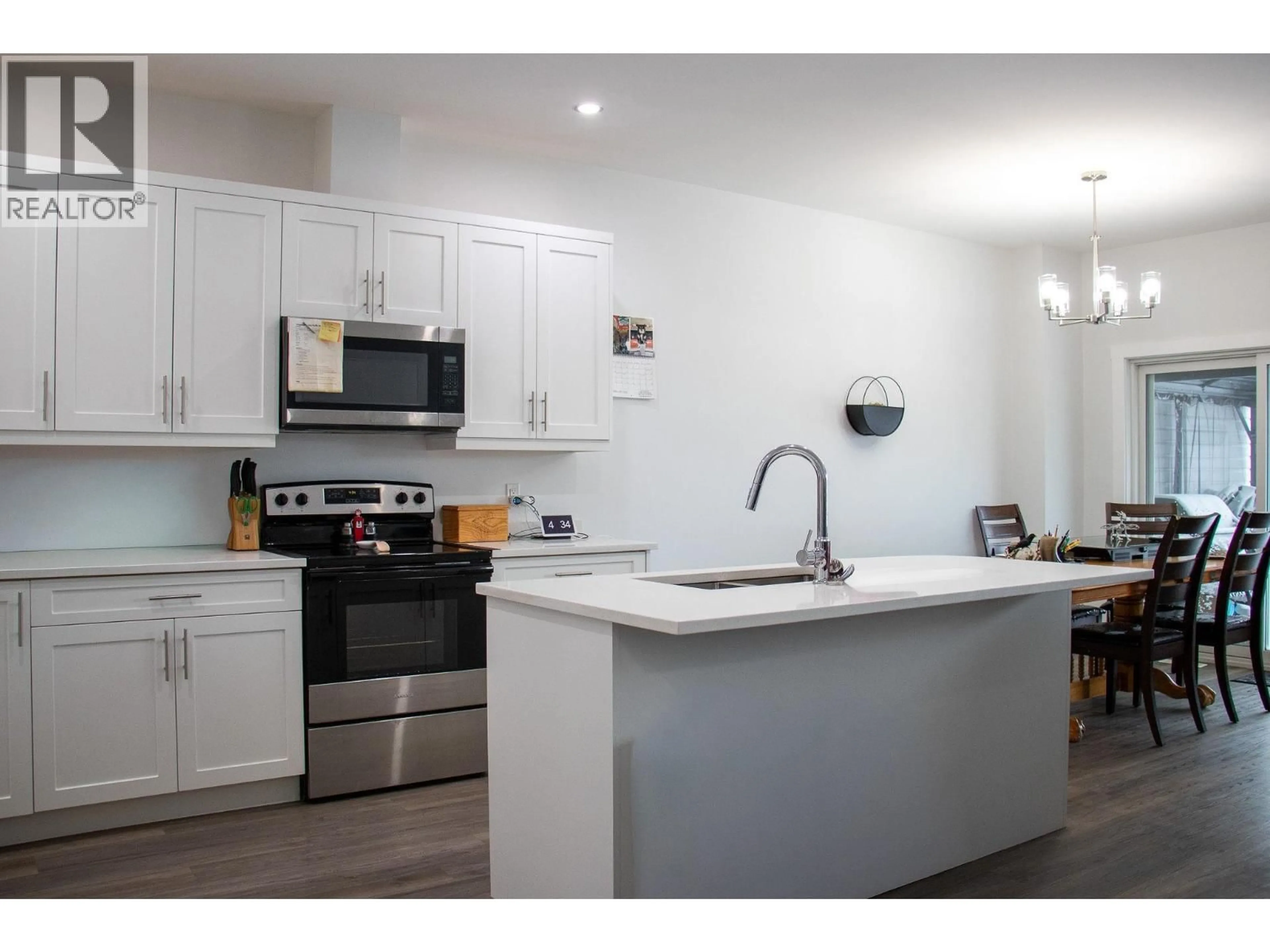 Open concept kitchen, ceramic/tile floor for 8423 81 STREET, Fort St. John British Columbia V1J0P4