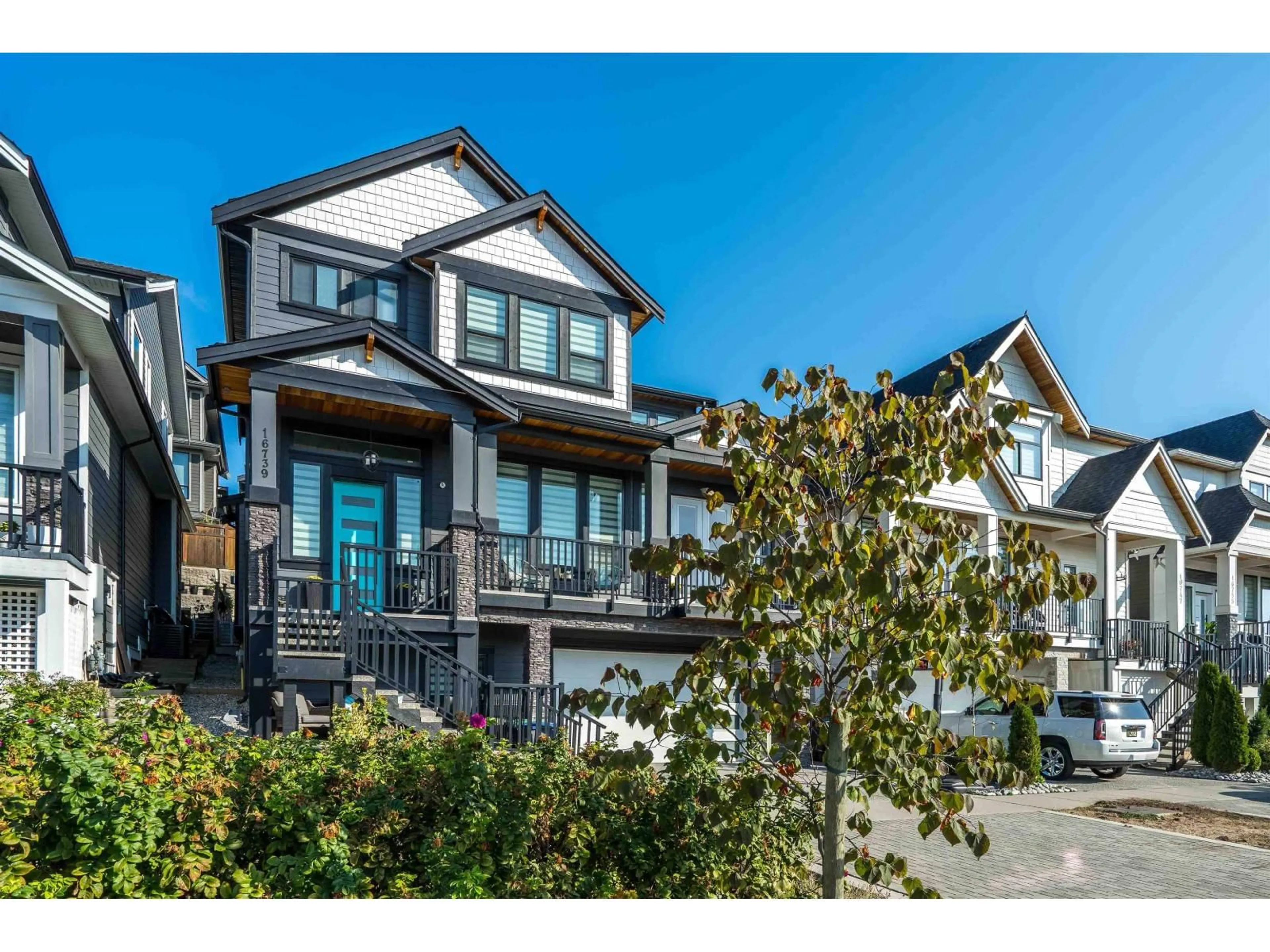 Home with vinyl exterior material, street for 16739 16A AVENUE, Surrey British Columbia V3Z0T3