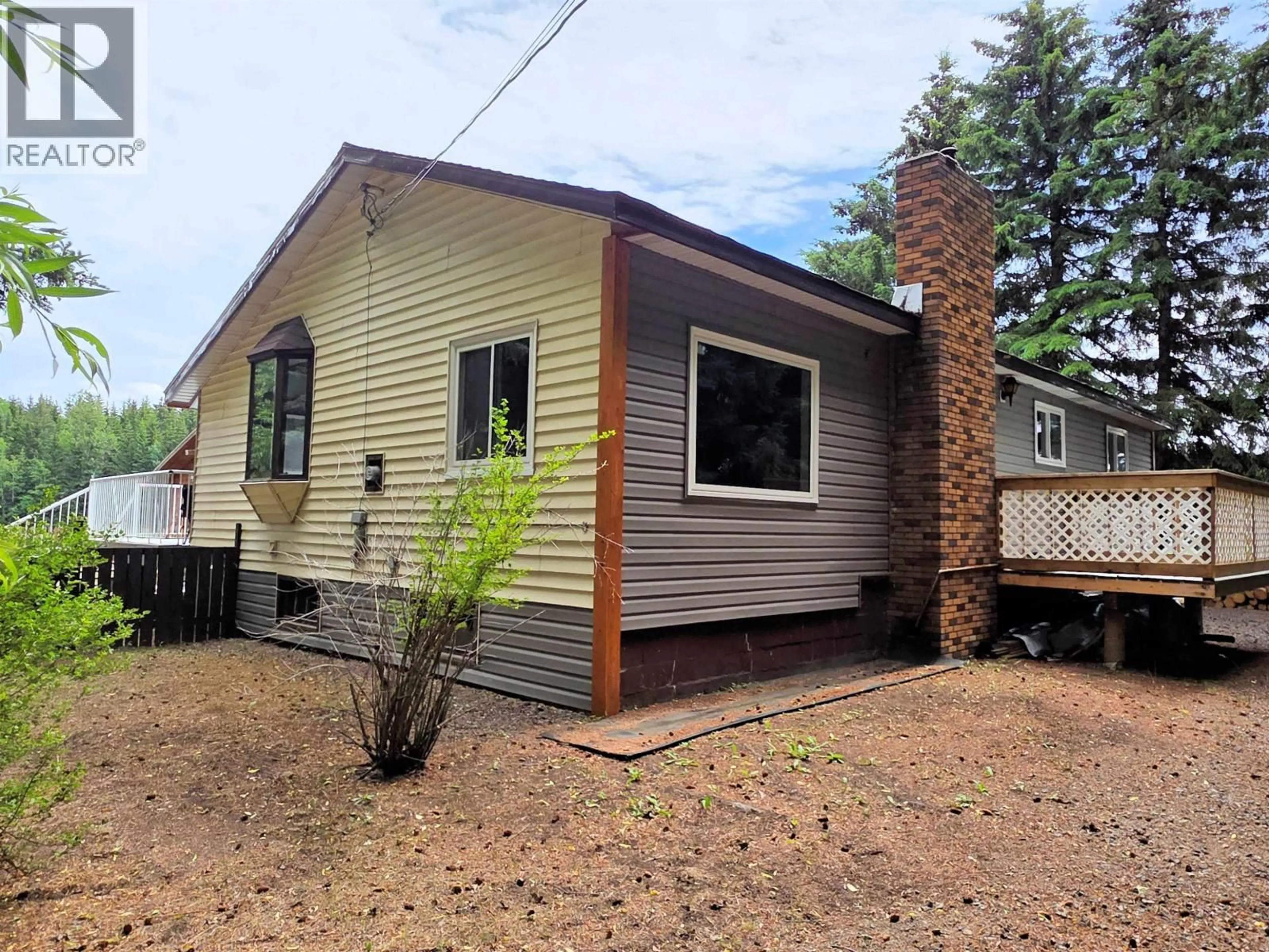 Home with vinyl exterior material, street for 2512 DOMINION AVENUE, Houston British Columbia V0J1Z0