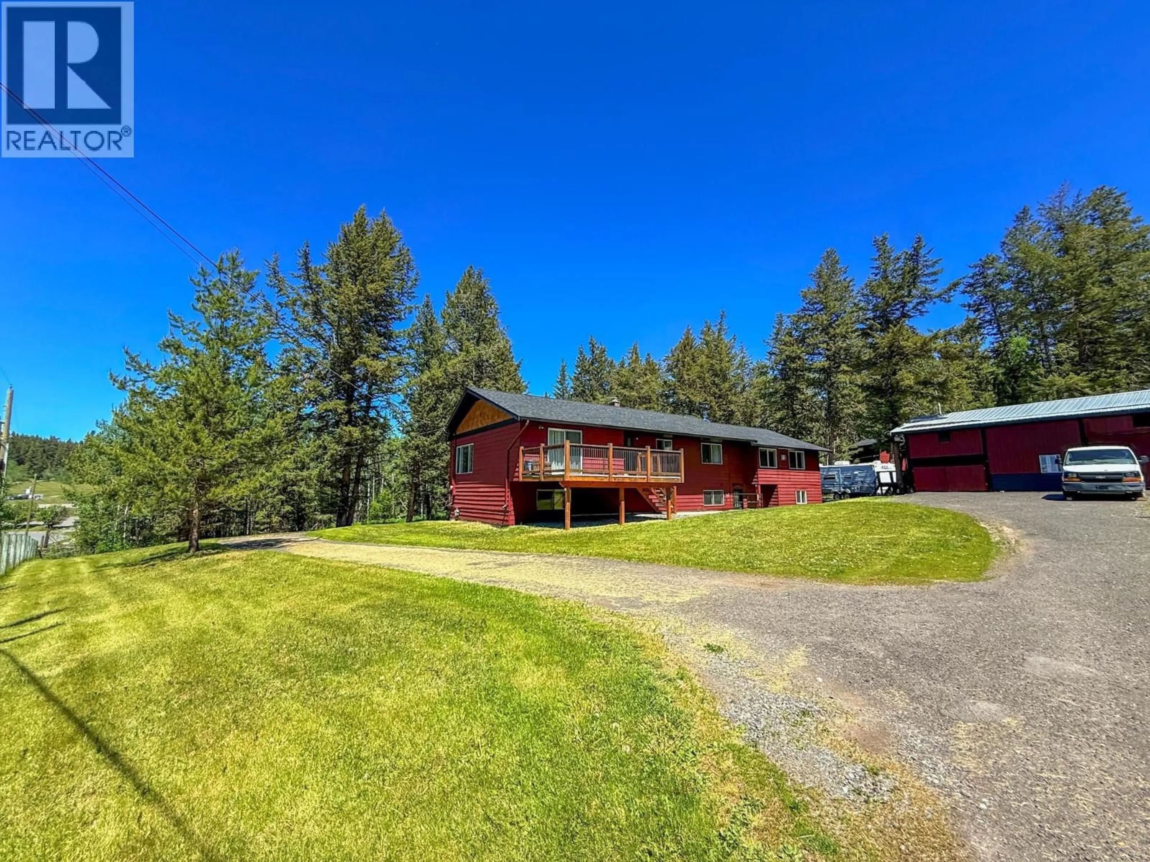 A pic from outside/outdoor area/front of a property/back of a property/a pic from drone, mountain view for 4719 CARIBOO DRIVE, 108 Mile Ranch British Columbia V0K2K0