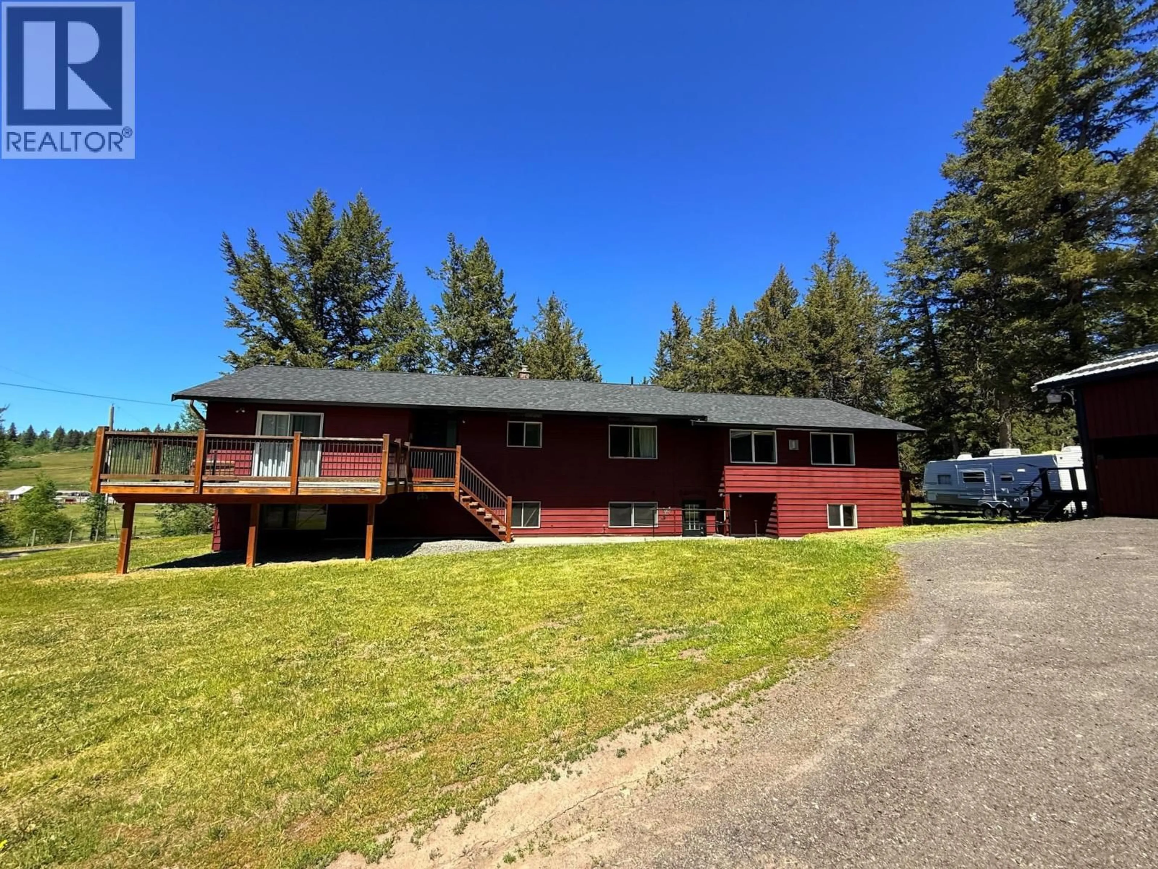 A pic from outside/outdoor area/front of a property/back of a property/a pic from drone, unknown for 4719 CARIBOO DRIVE, 108 Mile Ranch British Columbia V0K2K0