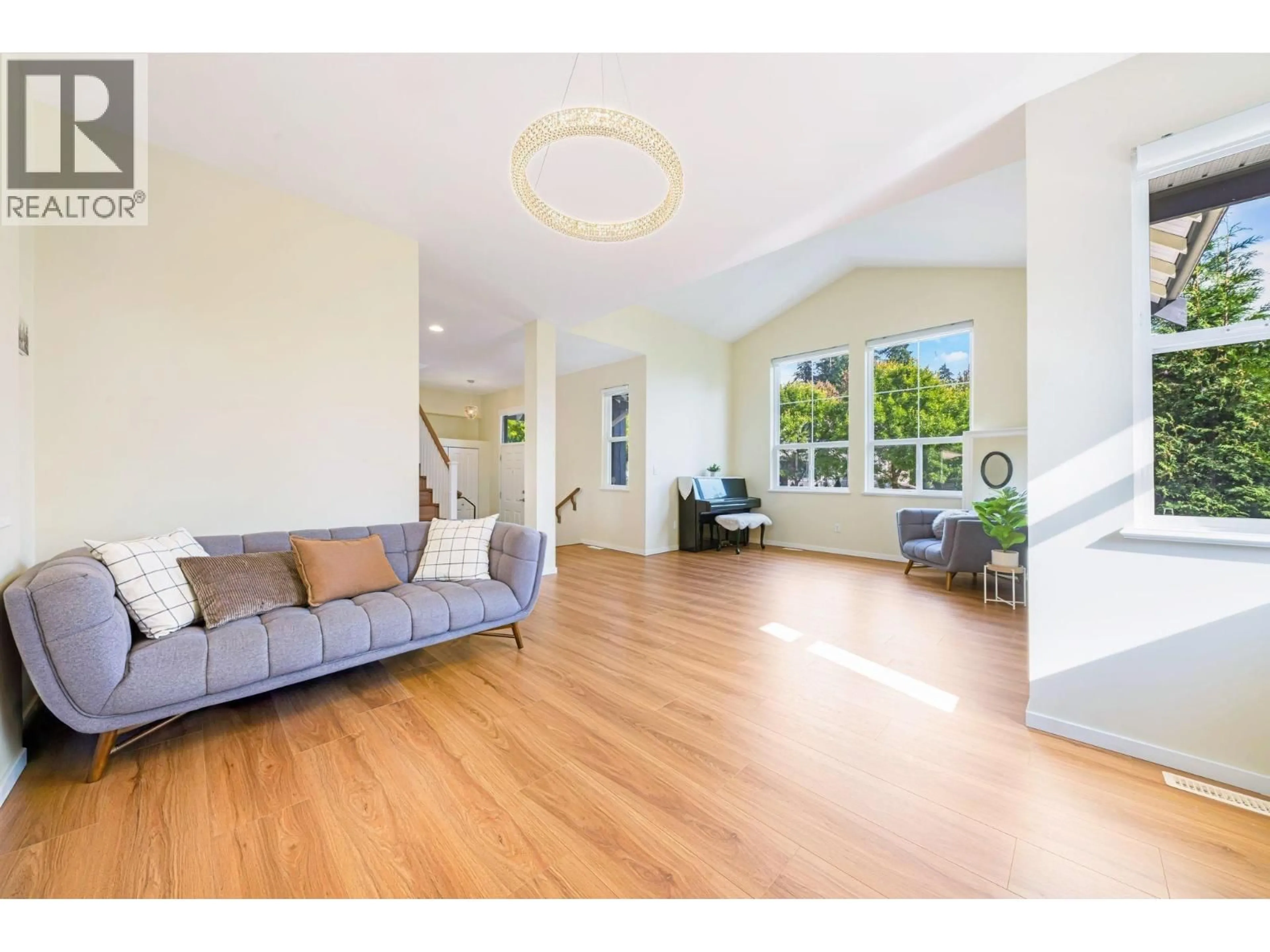 Living room with furniture, wood/laminate floor for 513 FOREST PARKWAY, Port Moody British Columbia V3H5M5